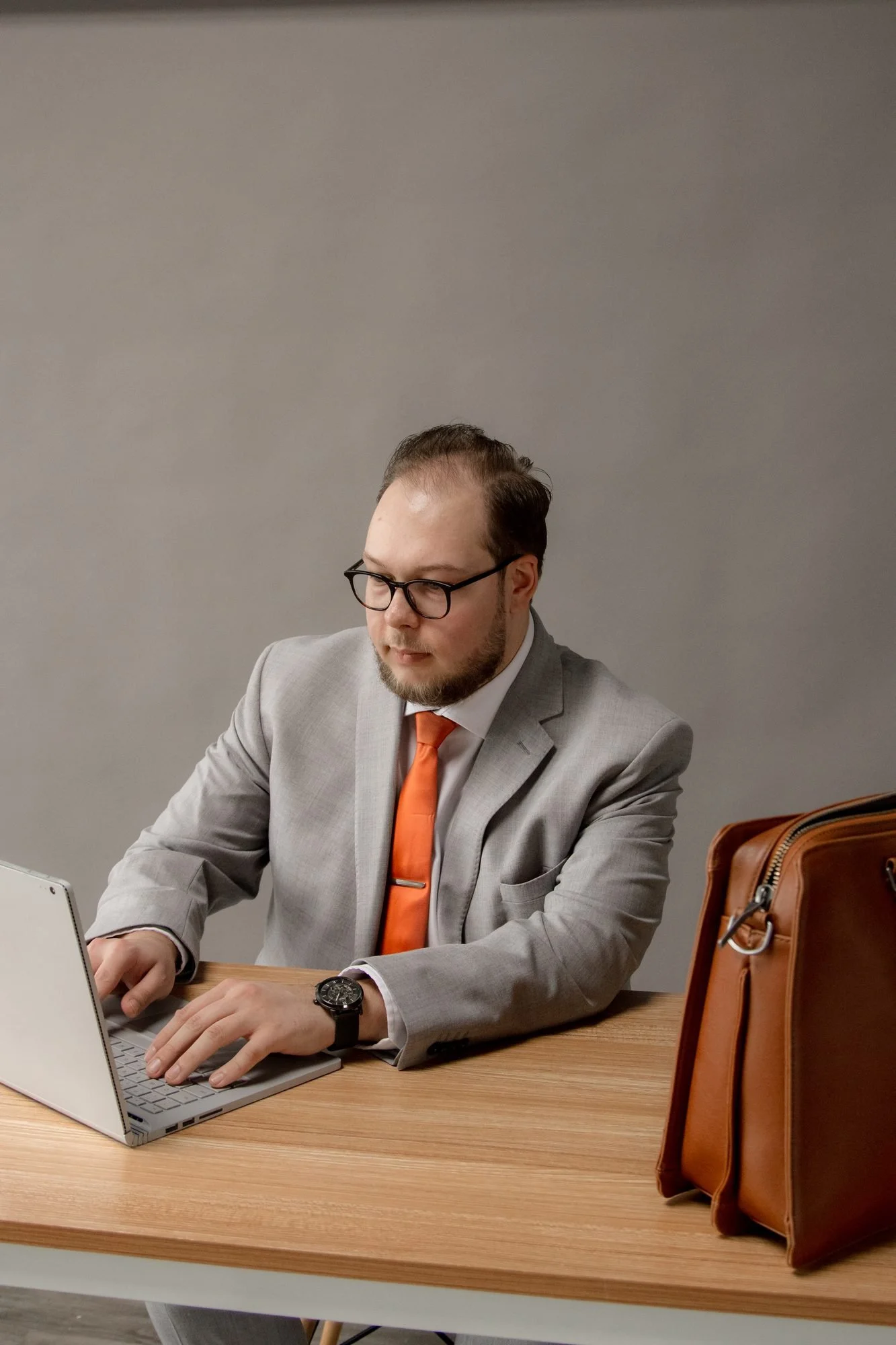 Chad McLetchie, founder of Chromatic Commerce working at his desk
