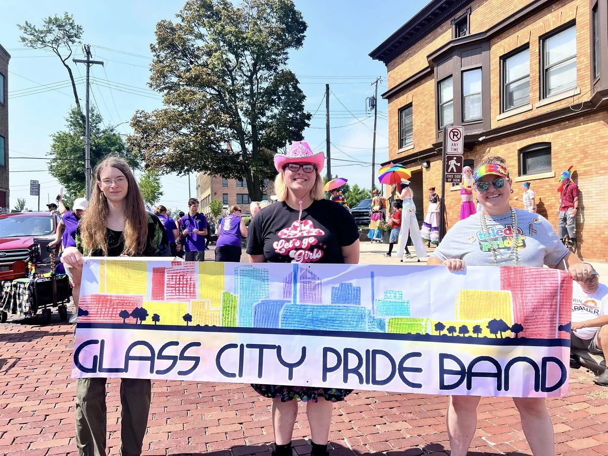Laurie’s customers, Larissa and Emmett, just married walking off the aisle together.