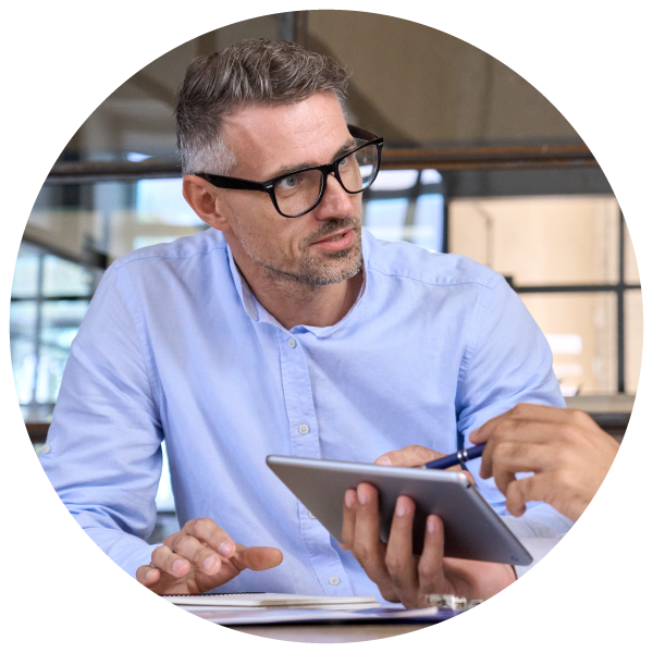 Male project manager speaking and presenting during a project meeting