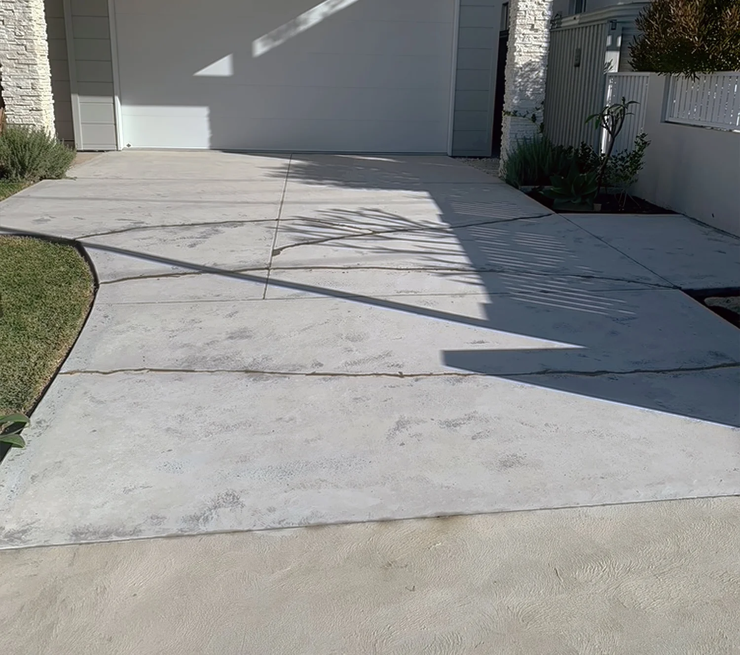 Weathered concrete driveway in Curl Curl before resurfacing