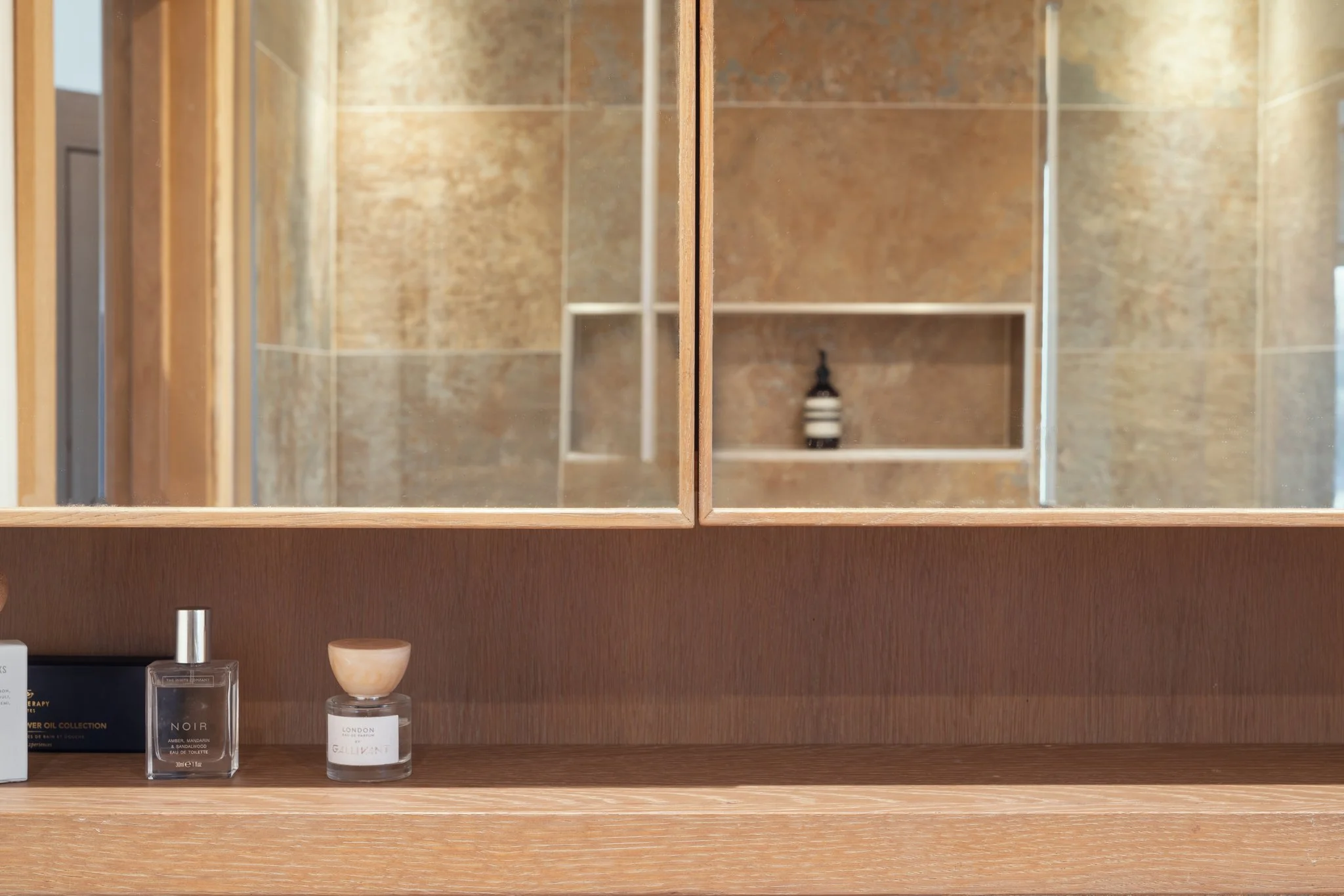 Bespoke oak bathroom cabinetry with integrated storage, Devon