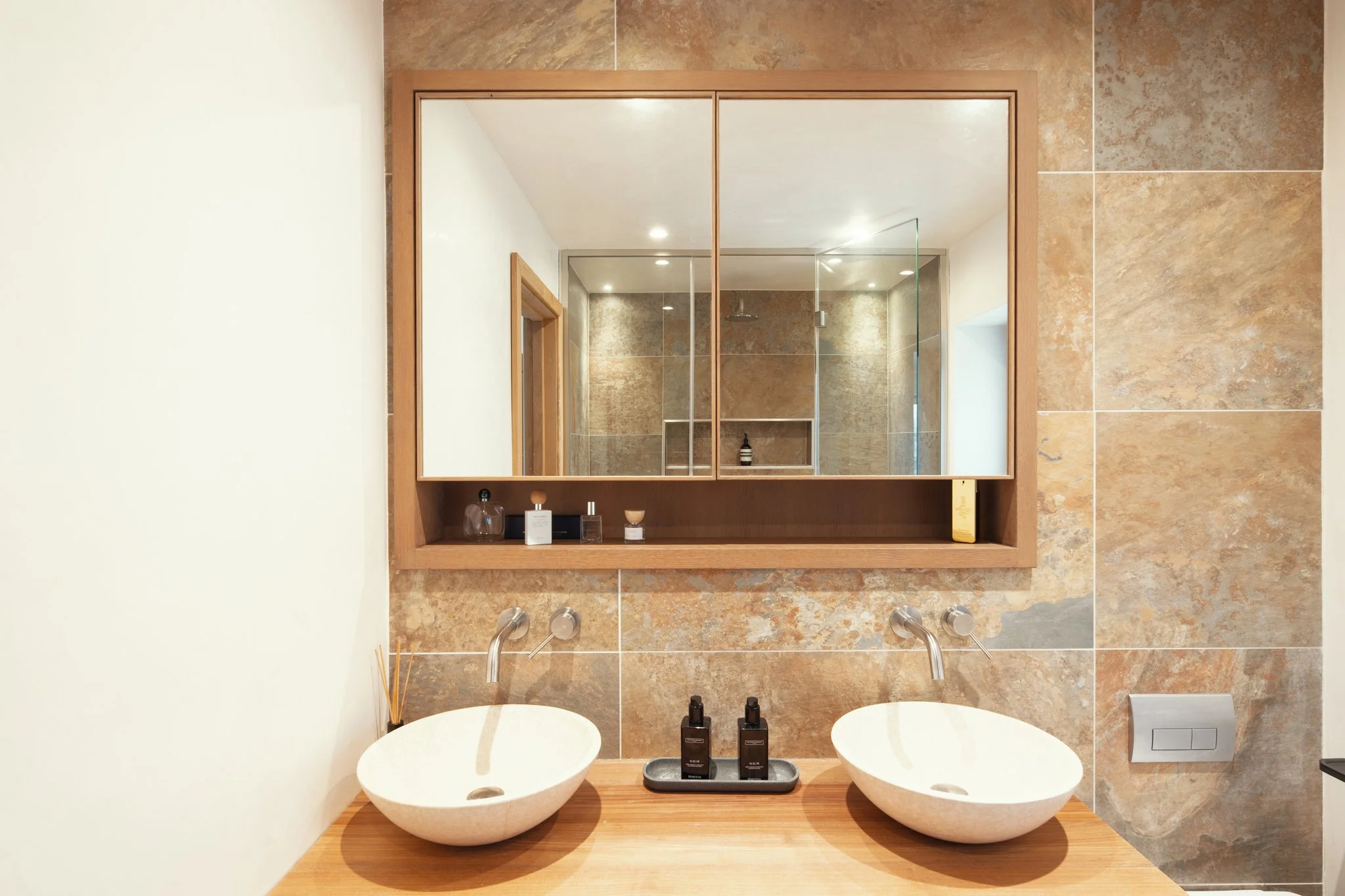 Bespoke oak bathroom cabinetry with integrated storage, Devon