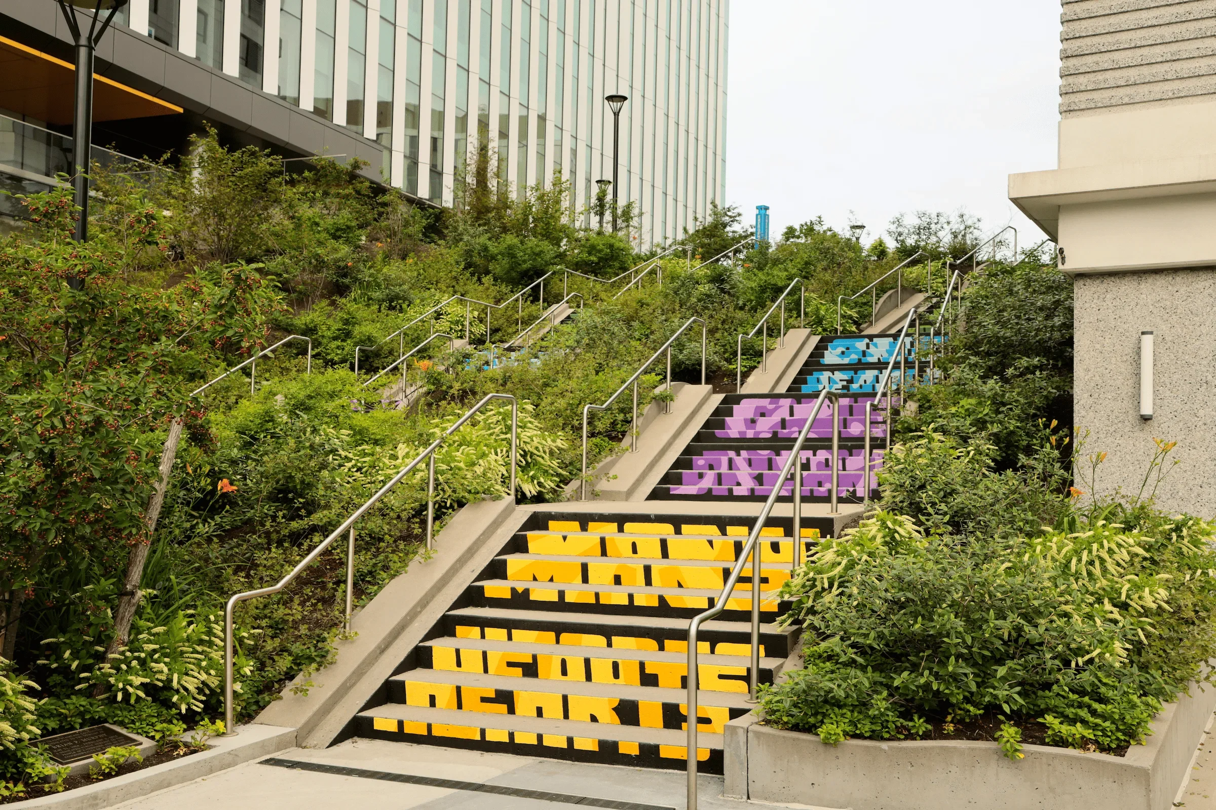  Michael Talbot &amp; Phoebe Warner,  Collective Ascension , 2023. Site-specific mural. Brian P. Murphy Memorial Staircase, Cambridge, MA. Project executed in collaboration with Community Art Center and facilitated by art_works for DivcoWest. © Micha