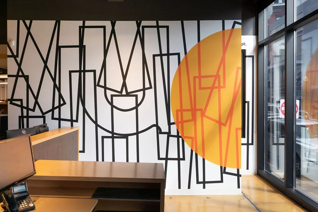  Cyrille Conan,  DIWAR-BENN (à propos) , 2024. Site-specific mural for Utile, 115 Kingston Street, Boston, MA. Project facilitated by art_works for Utile. © Cyrille Conan. Photography by Mel Taing. 