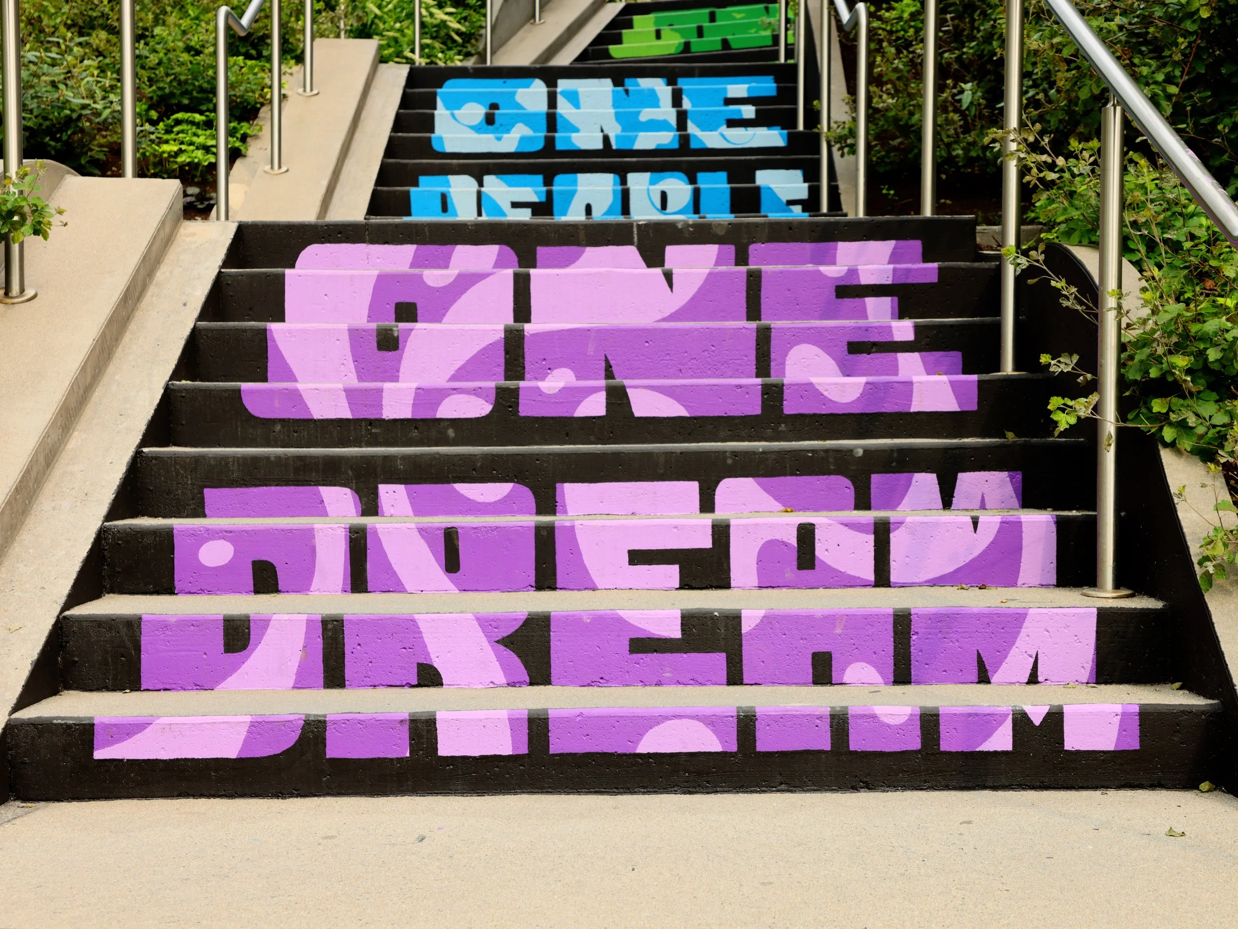  Michael Talbot &amp; Phoebe Warner,  Collective Ascension , 2023. Site-specific mural. Brian P. Murphy Memorial Staircase, Cambridge, MA. Project executed in collaboration with Community Art Center and facilitated by art_works for DivcoWest. © Micha