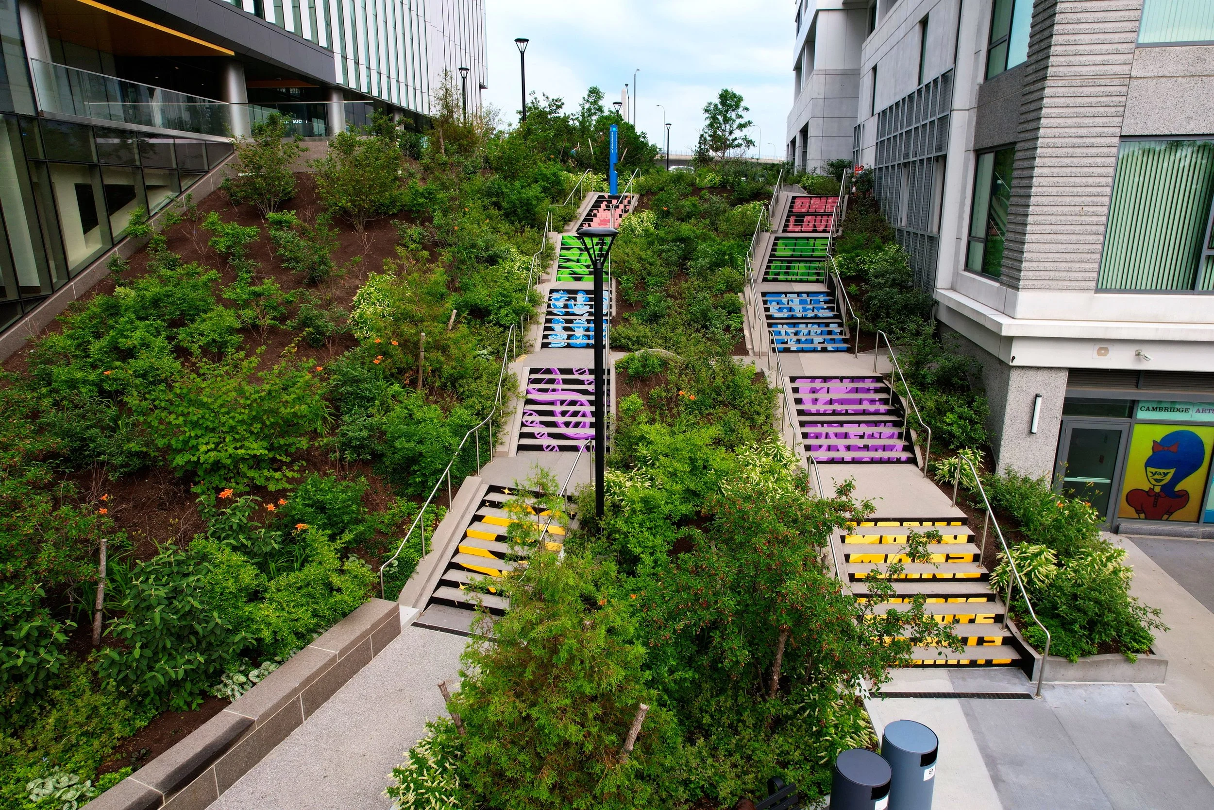  Michael Talbot &amp; Phoebe Warner,  Collective Ascension , 2023. Site-specific mural. Brian P. Murphy Memorial Staircase, Cambridge, MA. Project executed in collaboration with Community Art Center and facilitated by art_works for DivcoWest. © Micha