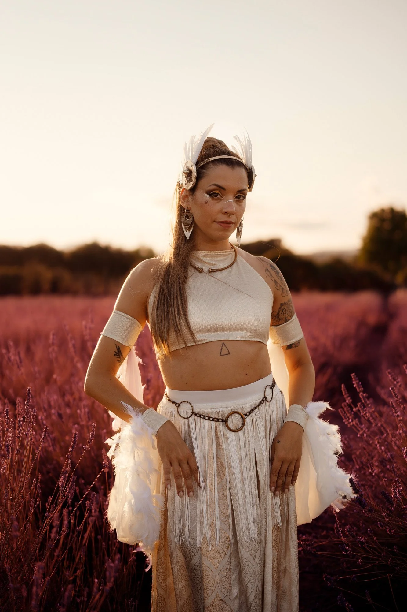 Fantasy tribal fusion portrait in a color-shifted field, warm and dreamy atmosphere.