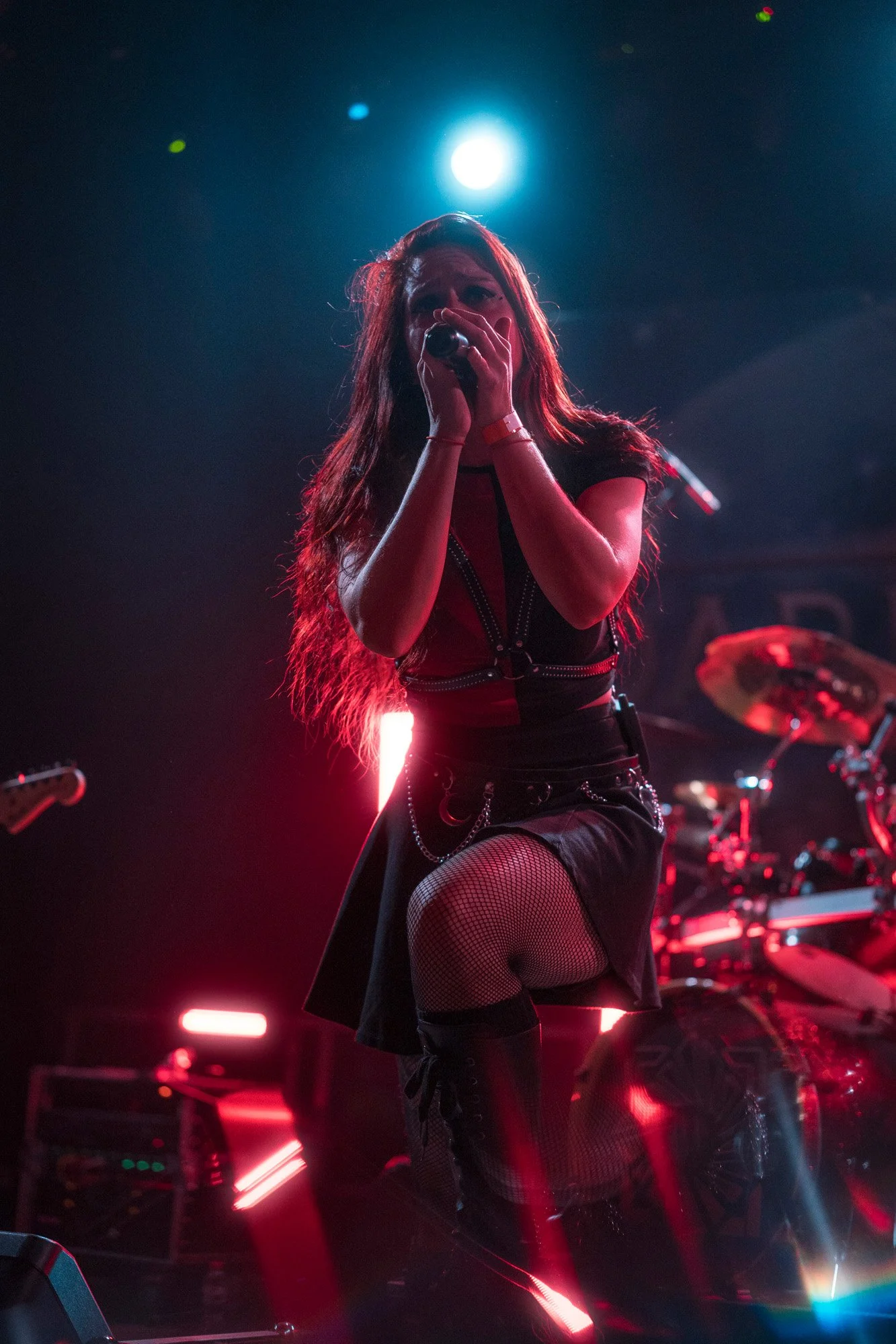 Metal band A Dark Reborn performing live at Menhir Fest, featuring vocalist Lur Burns Red on stage.