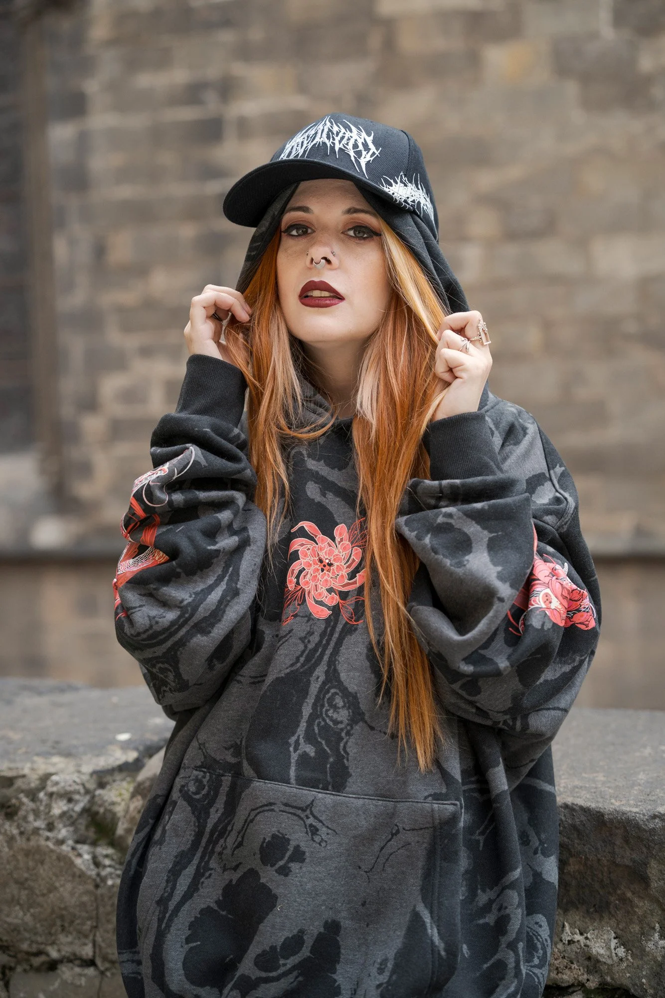 Close-up portrait of Shara Wolf wearing alternative gothic streetwear.