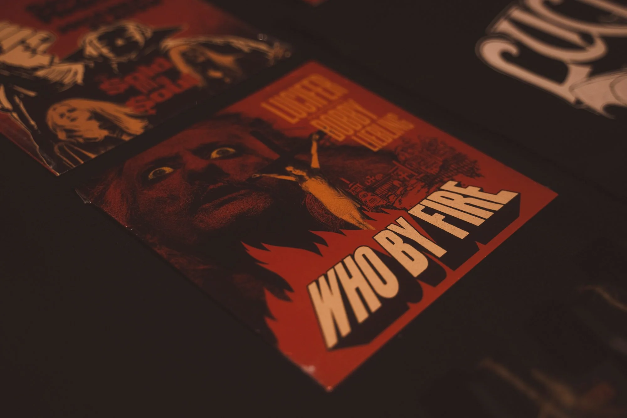 concert merchandise items displayed at rock show in Barcelona