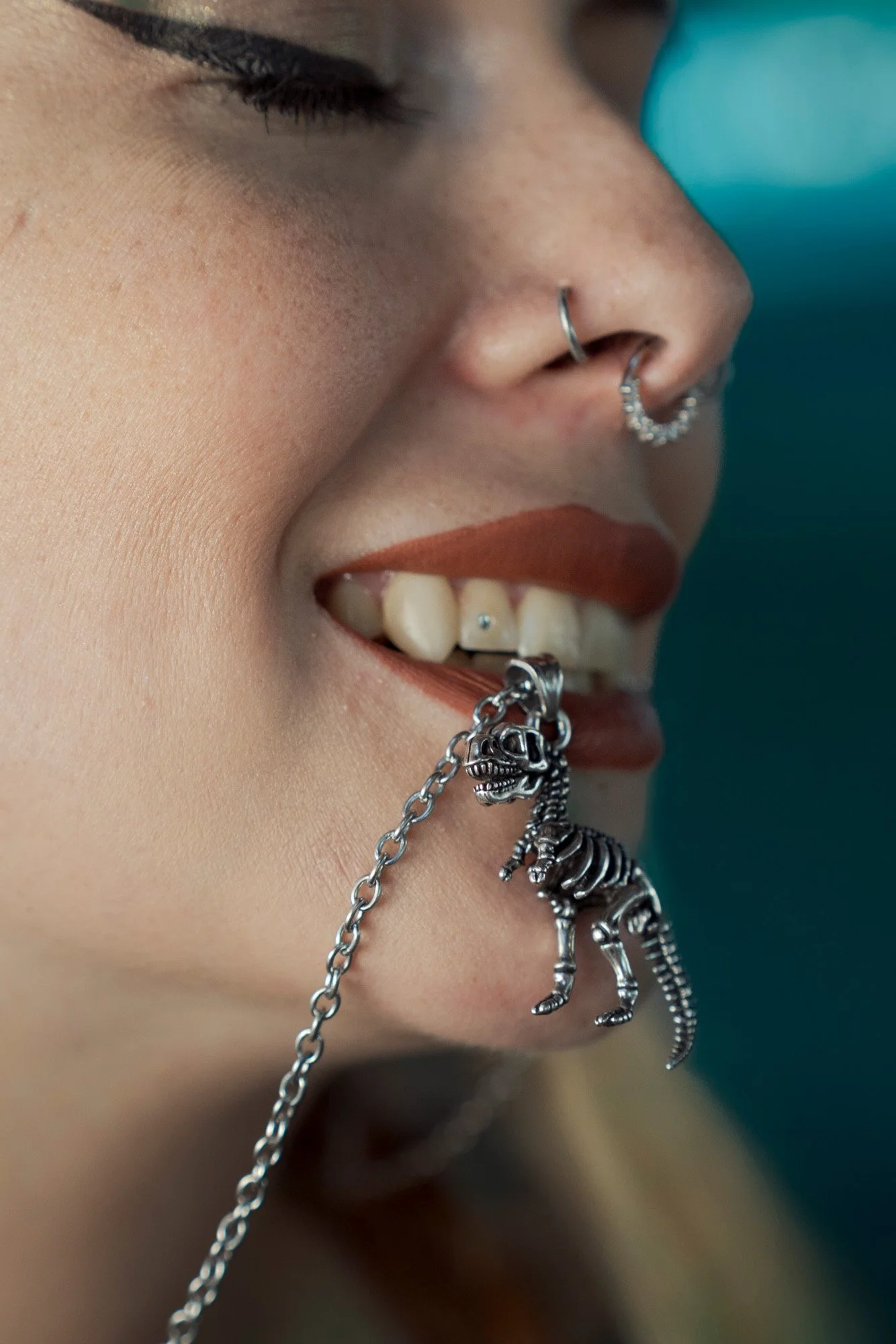 Fashion portrait reflected on glass architecture in Barcelona