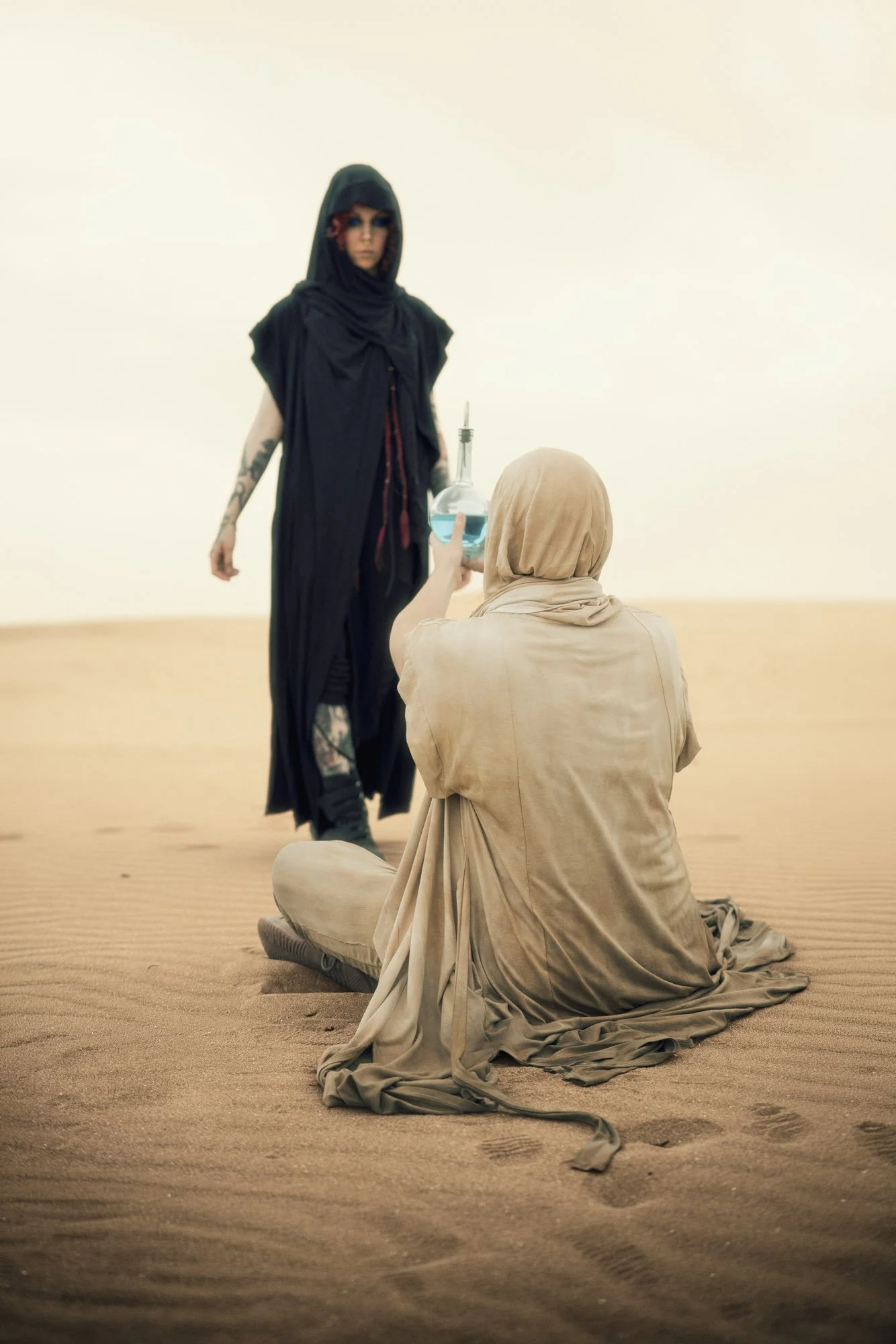 Reverend Mother and Fremen wanderer meeting in the desert of Arrakis