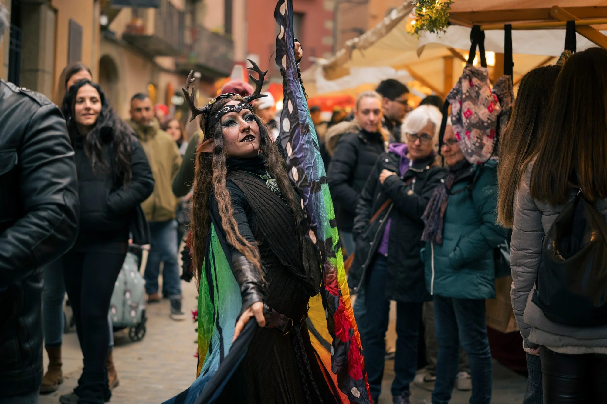 Ritual dance performance by La Nariz Roja  photographed in a public square, mercat medieval Vic, Spain.