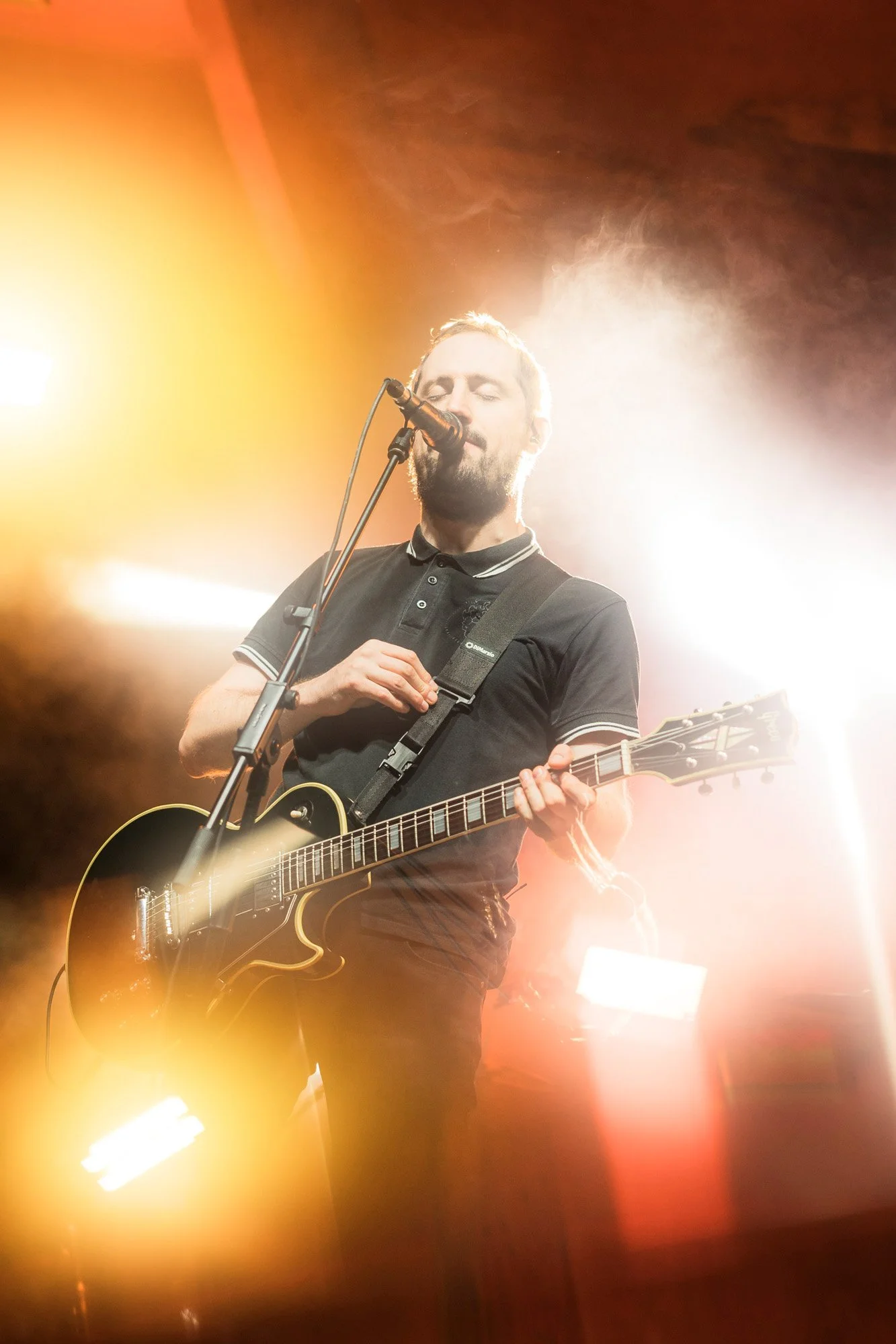 Catalan folk rock band Ebri Knight performing live on stage during a concert.