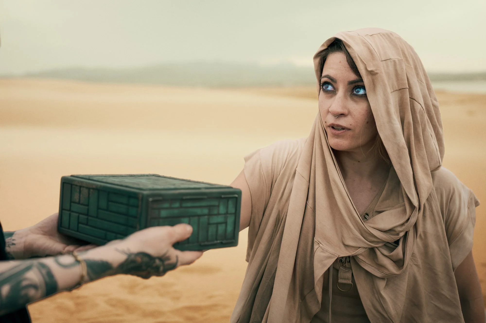 Lidia Martin facing the Gom Jabbar test while a Reverend Mother holds the pain box