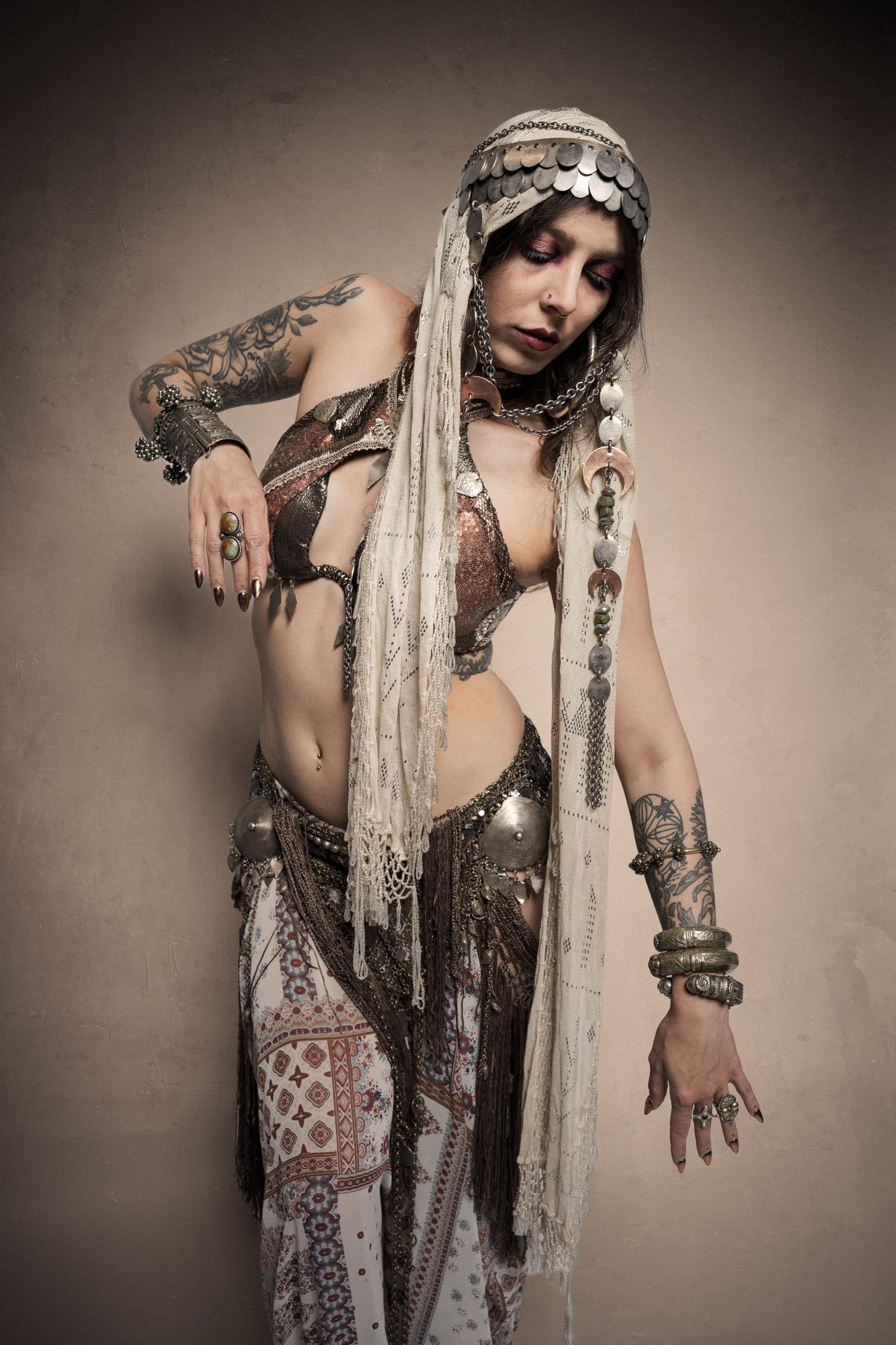full body artistic portrait of Cosmosdaughter in neutral studio setting