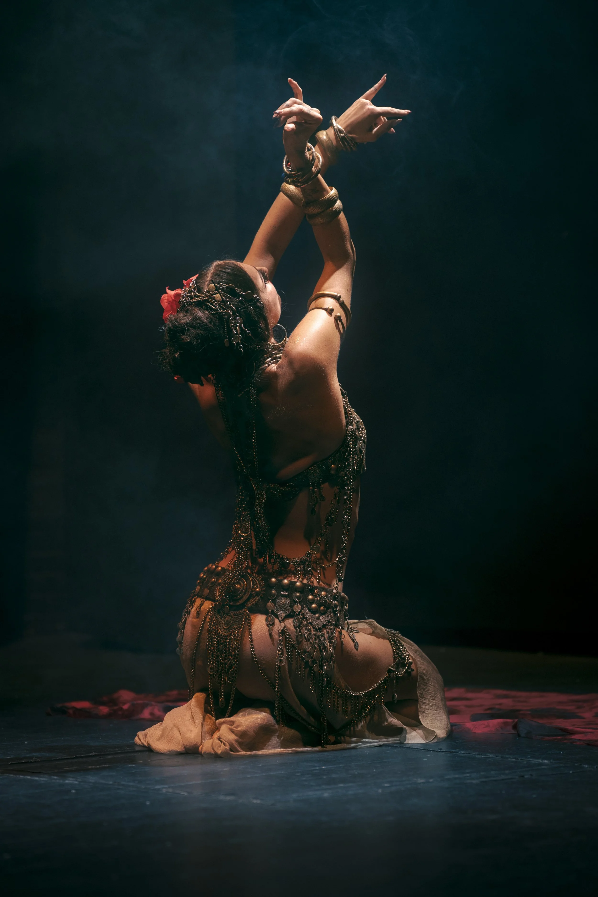 Alisa Gurova posing on stage during tribal fusion performance.