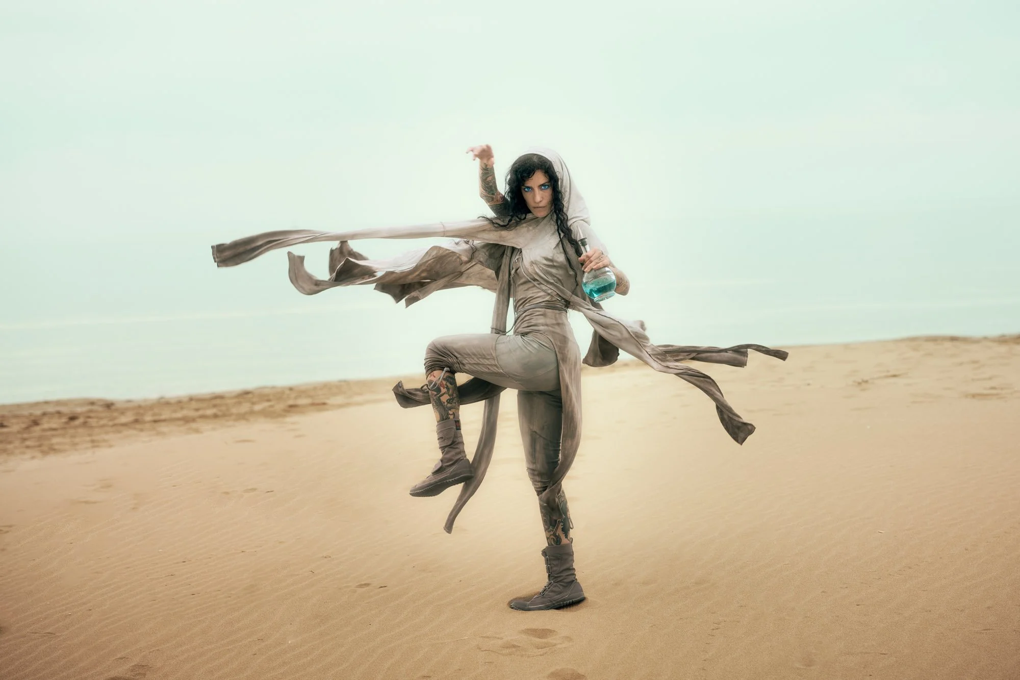 Sandra Roll as a Fremen wanderer moving through the desert with flowing costume