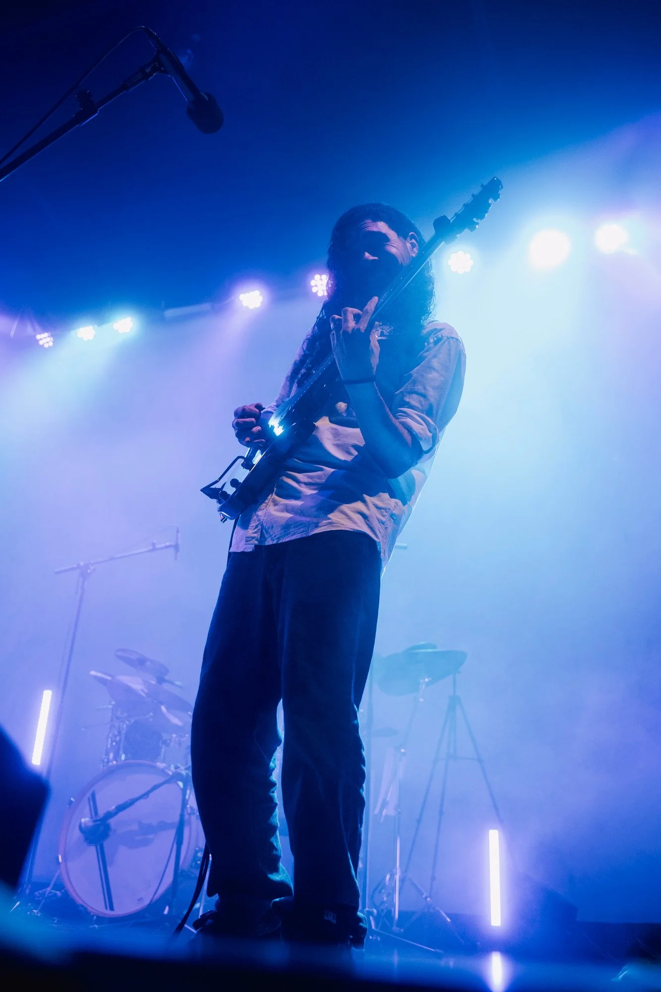 Electric guitarist playing during Serapis Project live performance.