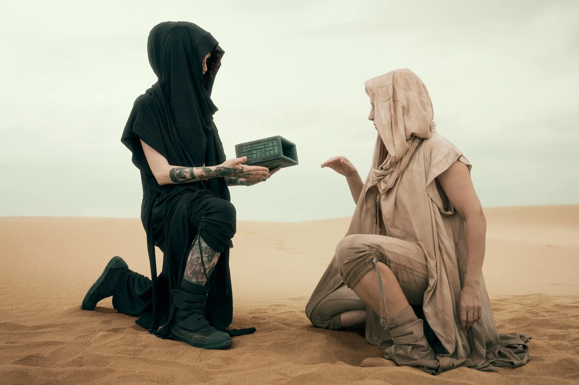 Reverend Mother preparing a Fremen wanderer for the Gom Jabbar test