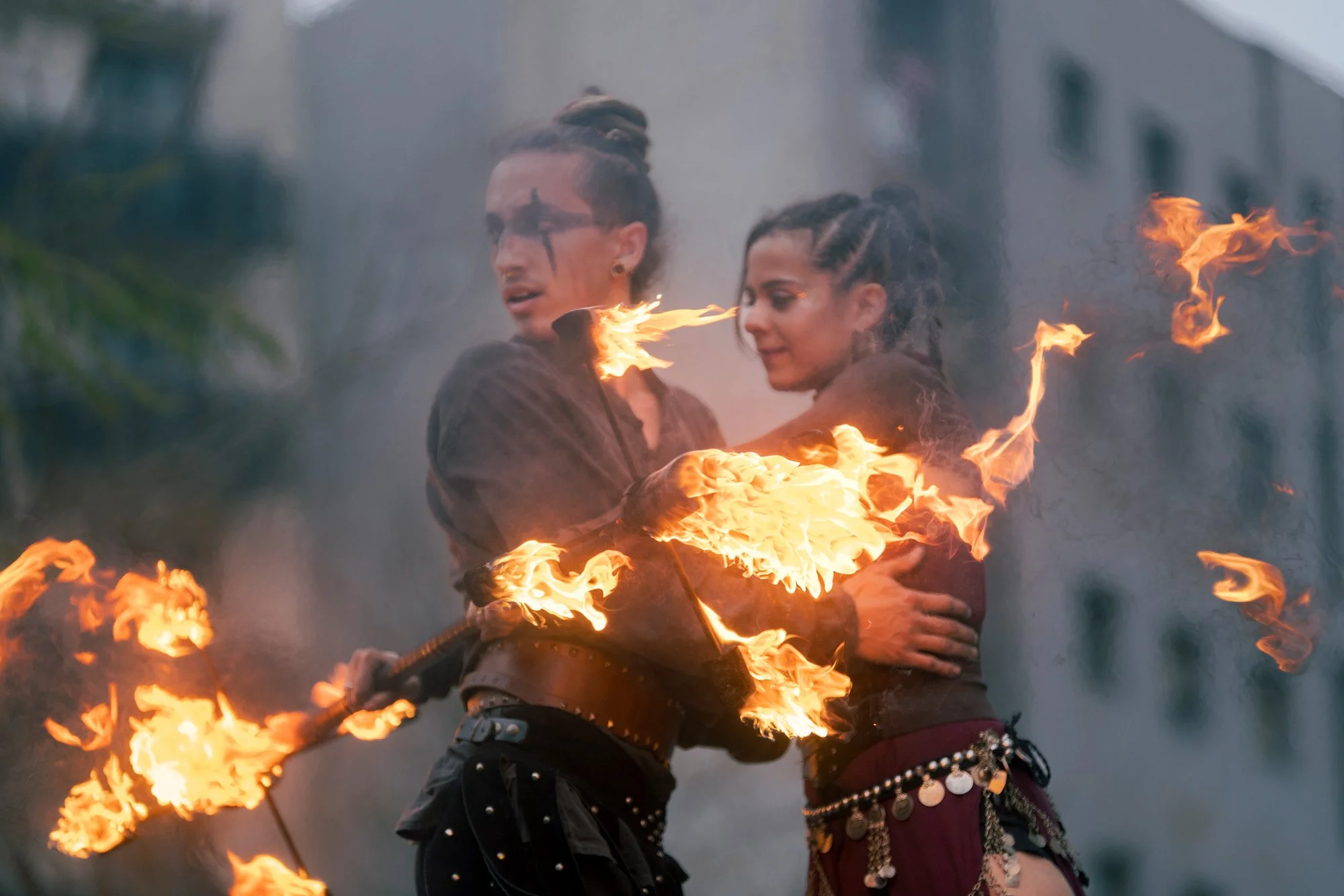 Closing moment of Pendrafoc fire performance, combining trust, movement and live flames.