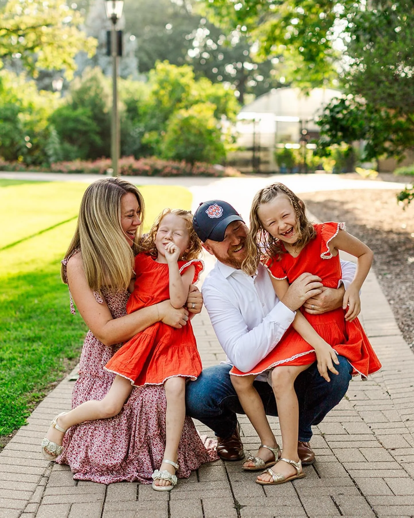 Had an amazing photo session at Lilacia Park in Lombard with another adorable family including their dogs. 🐕 🐶 Shannon reached out to capture special moments with their beloved dog, Bally, who was getting up there in age. The yellow flowers and flo