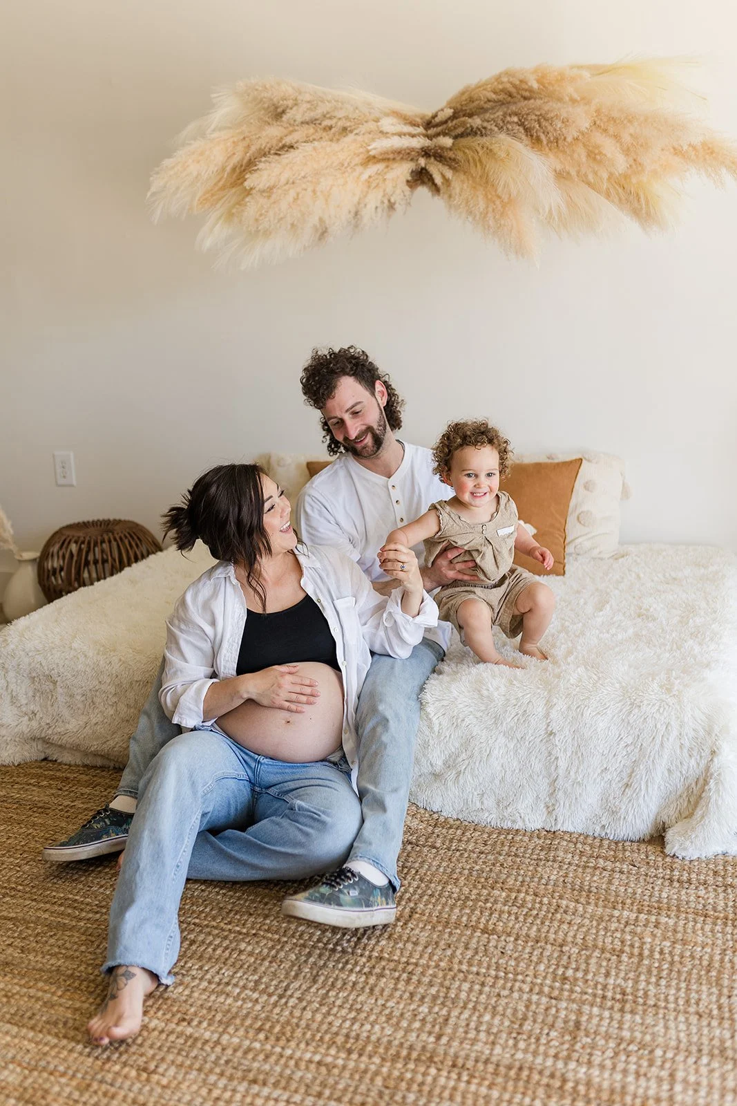 pregnant woman photo shoot husband daughter