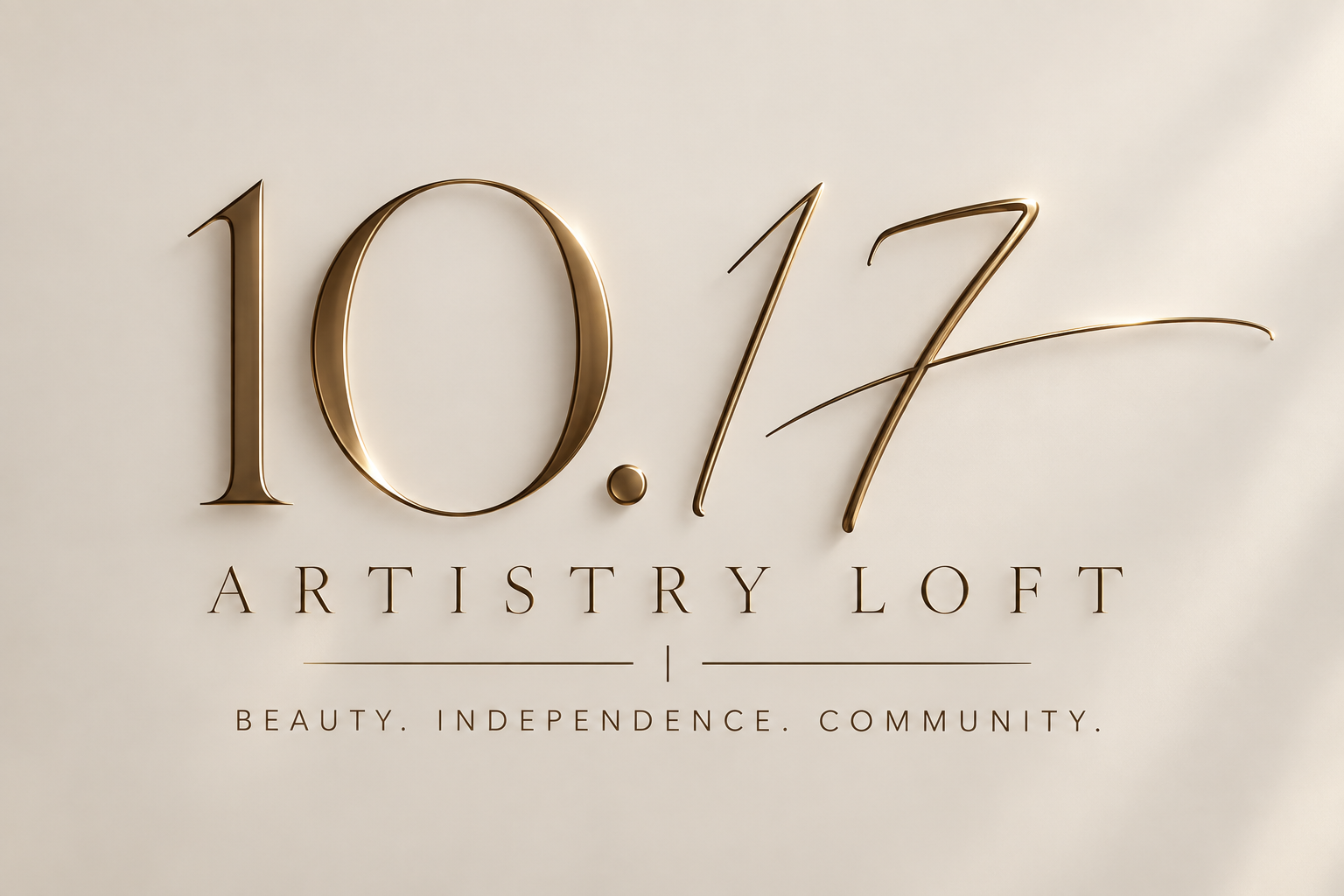 Elegant sign with gold metallic numbers 10.17 and the words ARTISTRY LOFT below, along with the tagline 'Beauty. Independence. Community.'