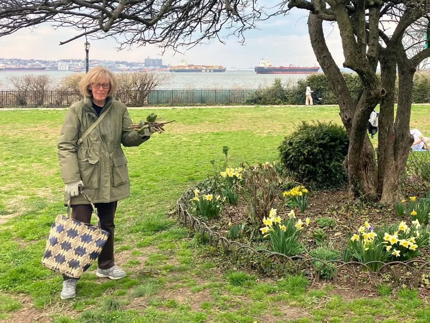 Linda Dahl cleaning tree pits 