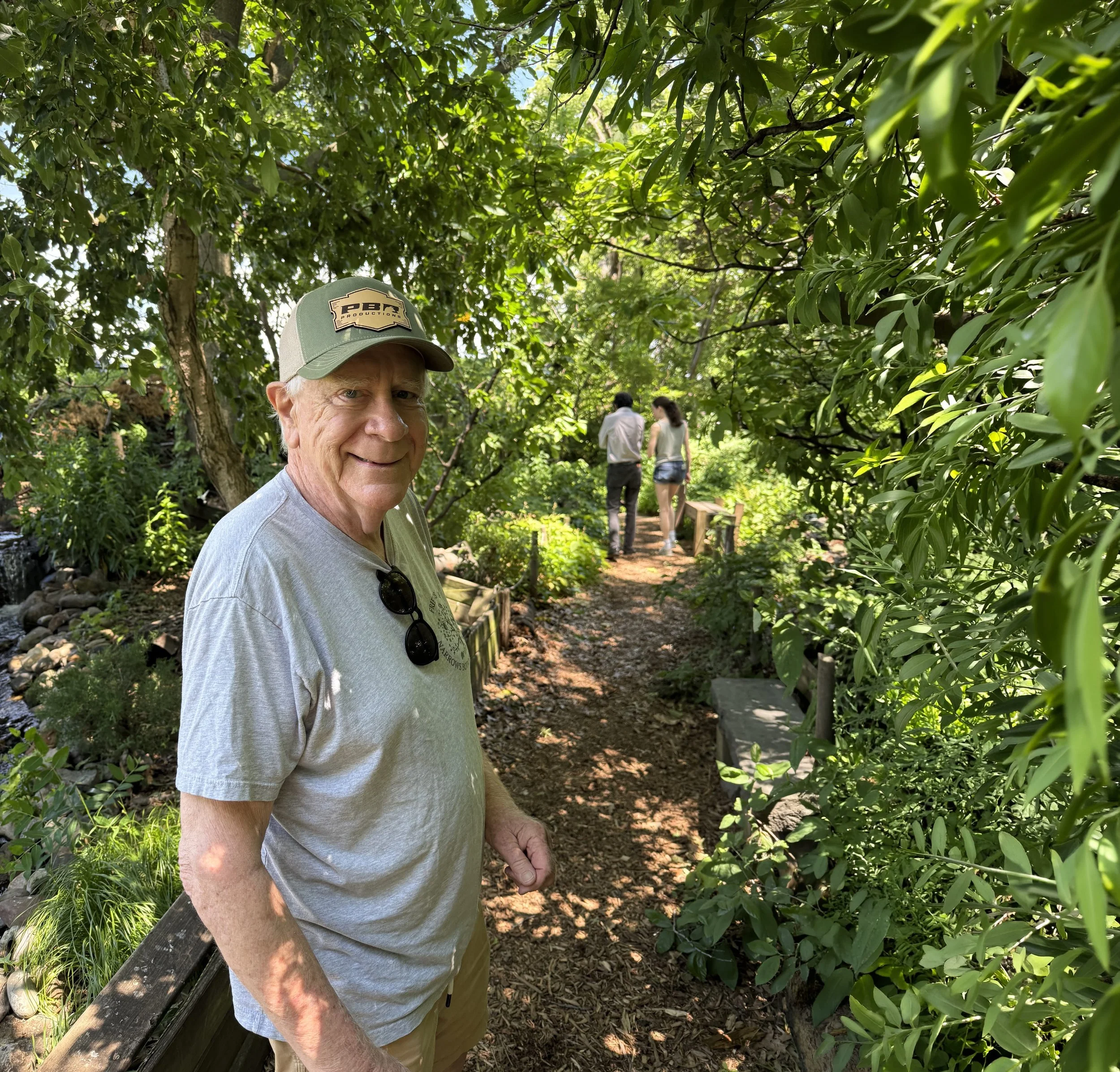 Clayton Rawson standing in the garden