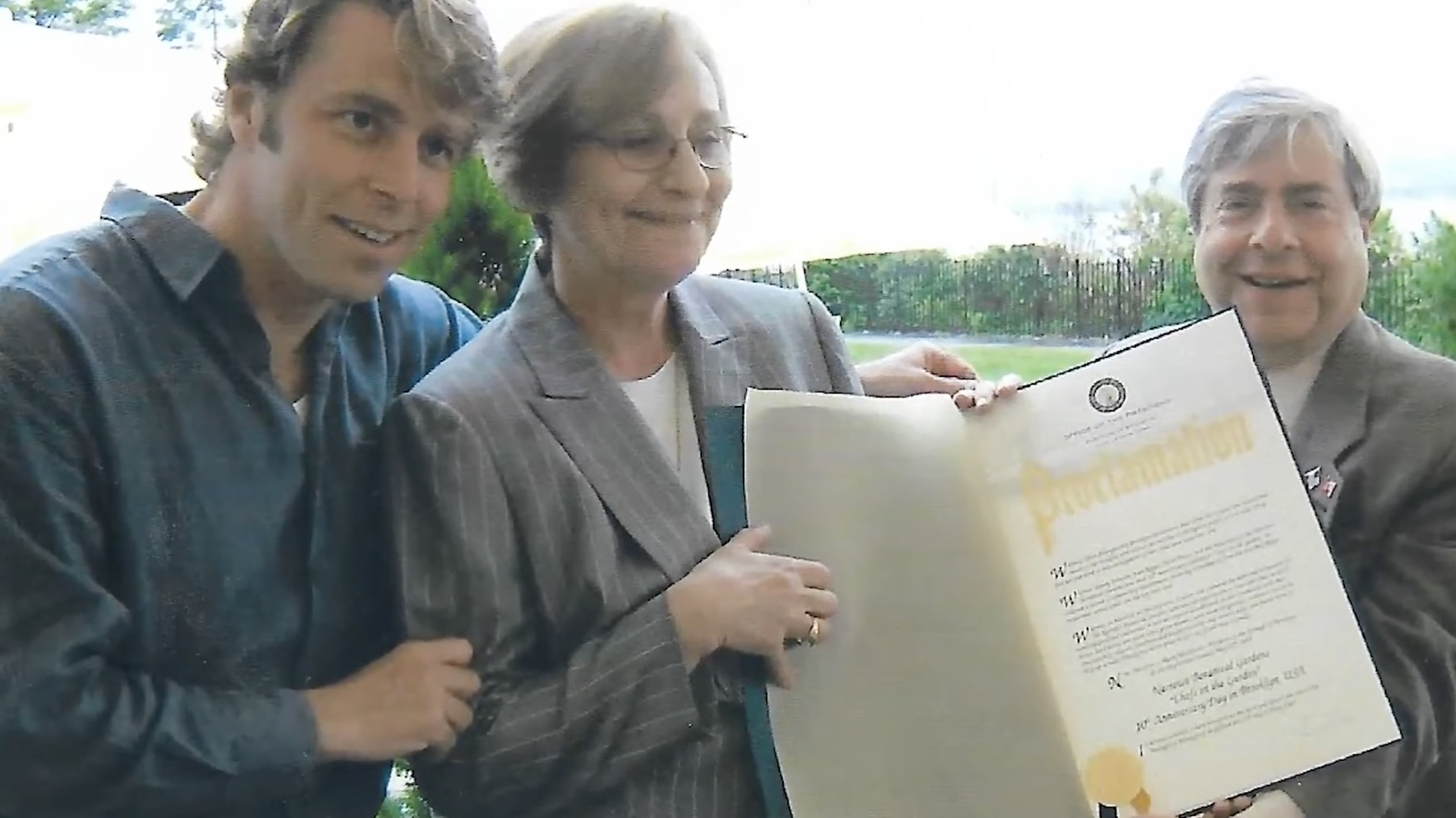 1995 opening ceremony Jimmy Johnson and Joan regan holding certificate