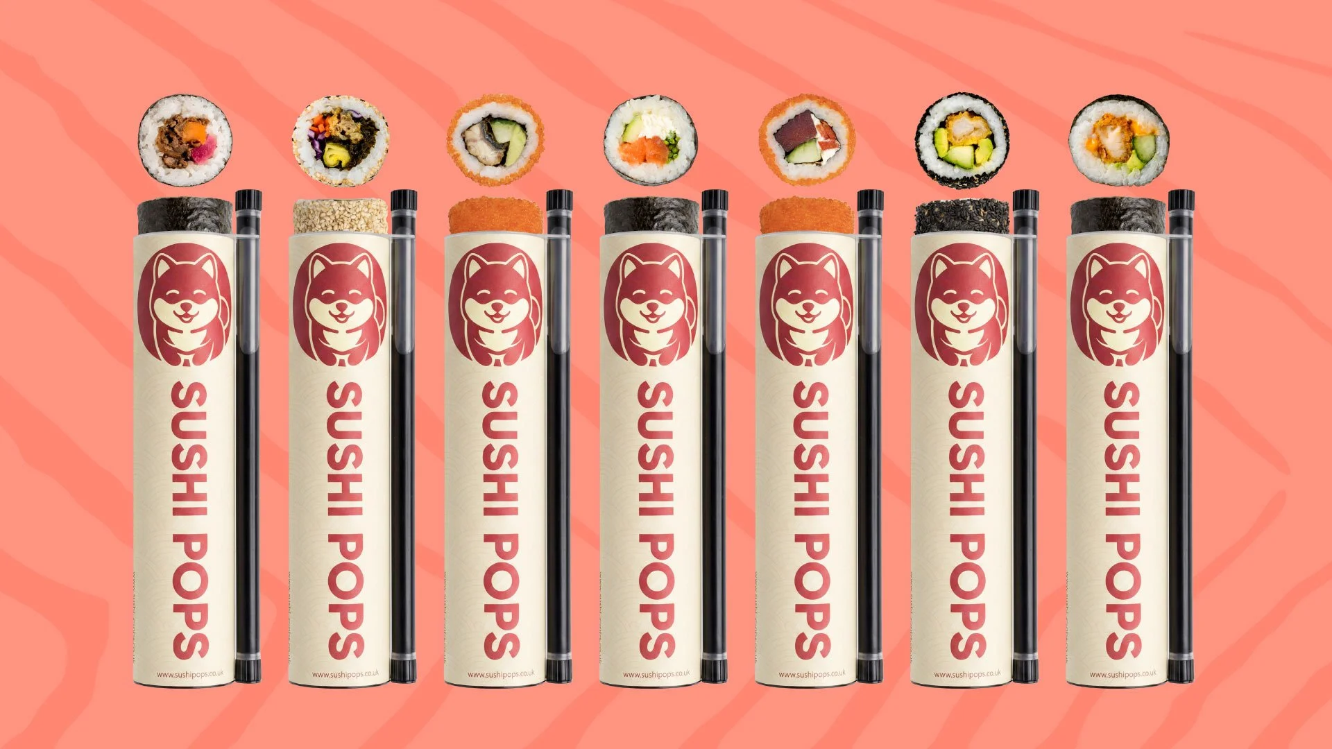 Multiple sushi rolls on top of large white paper tubs with black chopsticks in front, against a pink background.