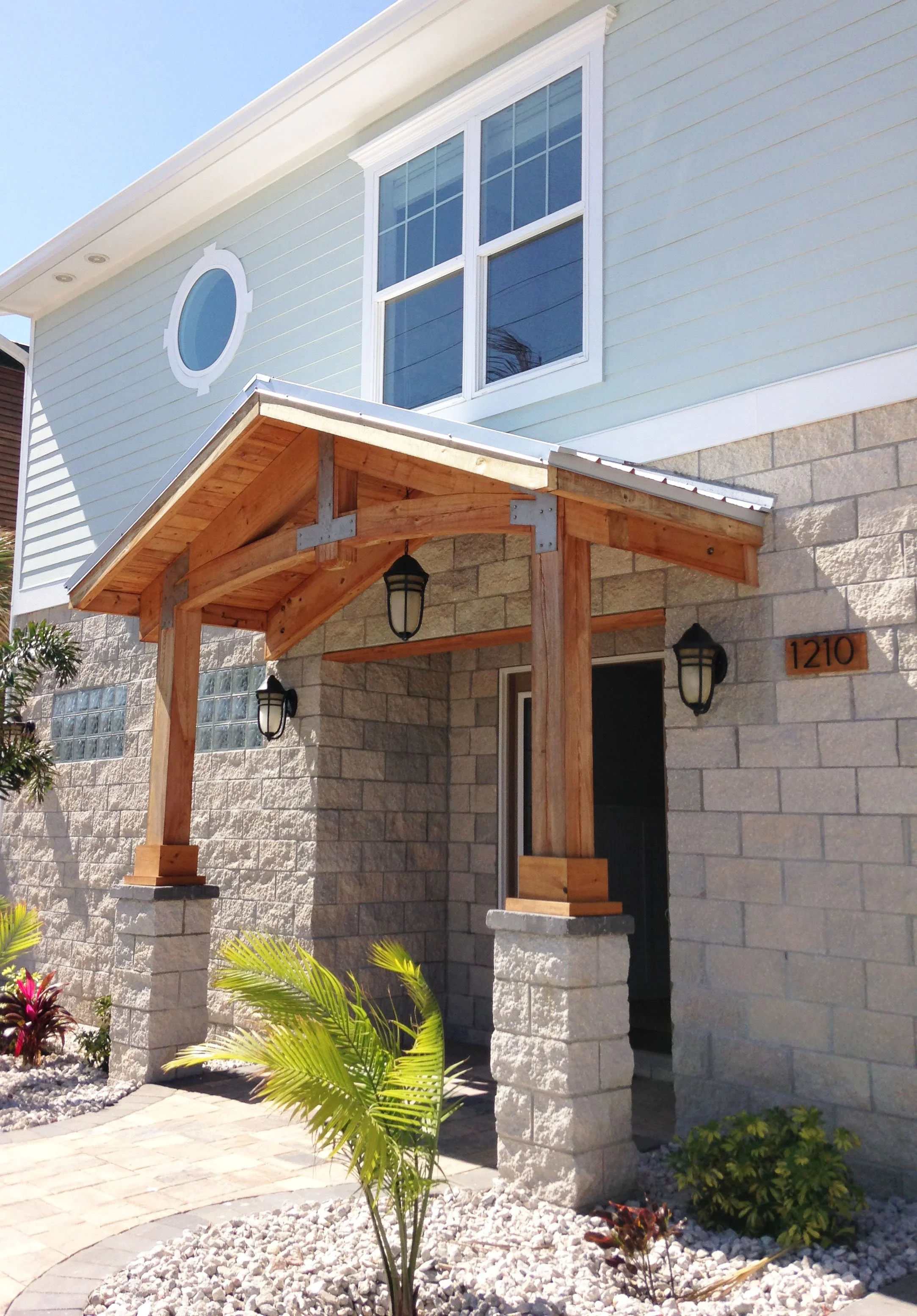 exterior of two-story home built by island dream homes