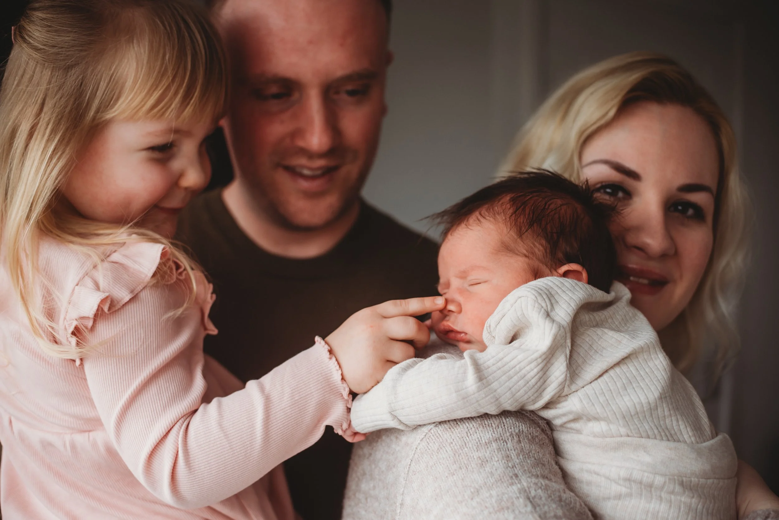 Newborn photos at home after a C-section: A relaxed session with a toddler and 11 day old baby
