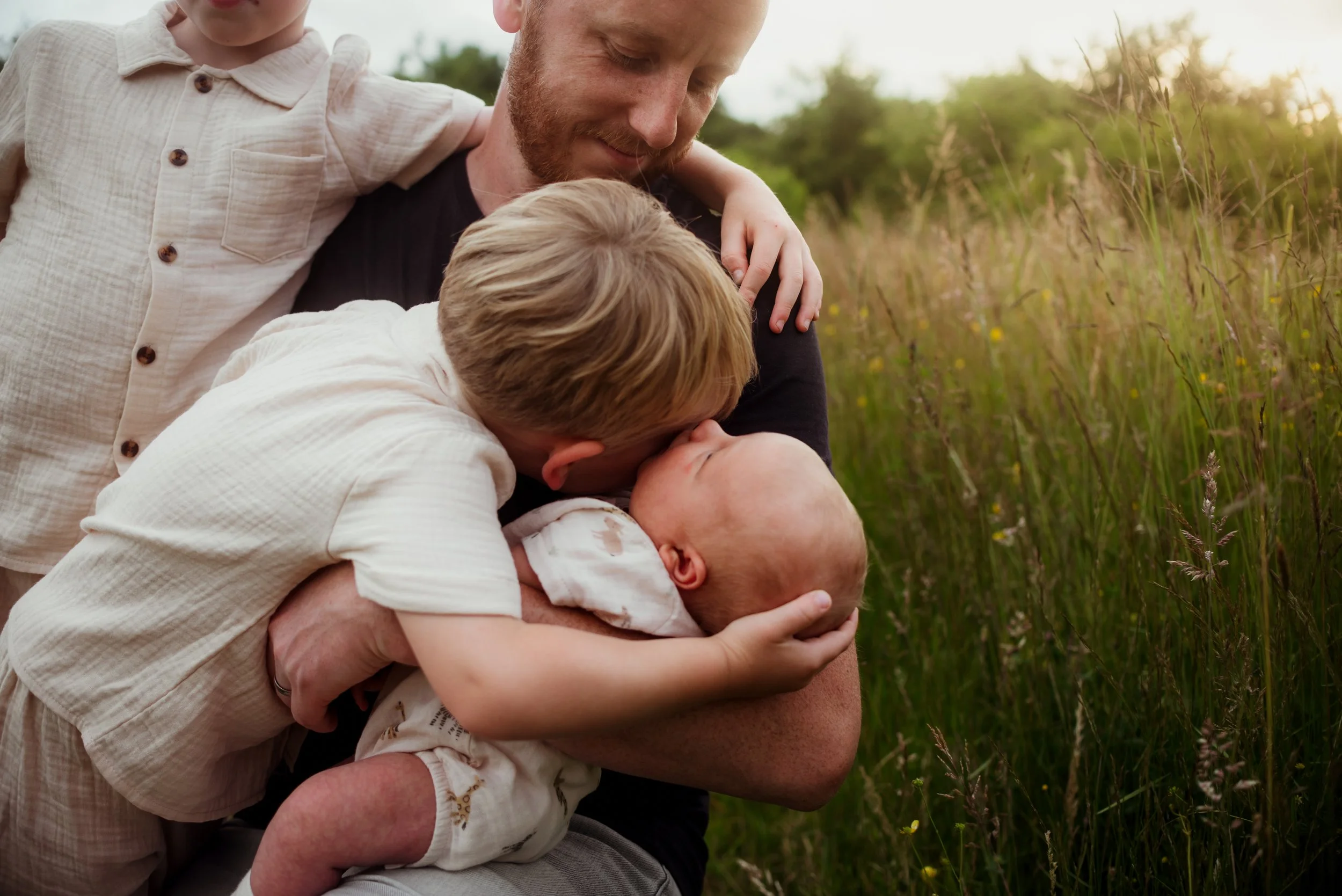 A spring meadow, a new baby, and a family feeling complete | Outdoor Newborn photography York