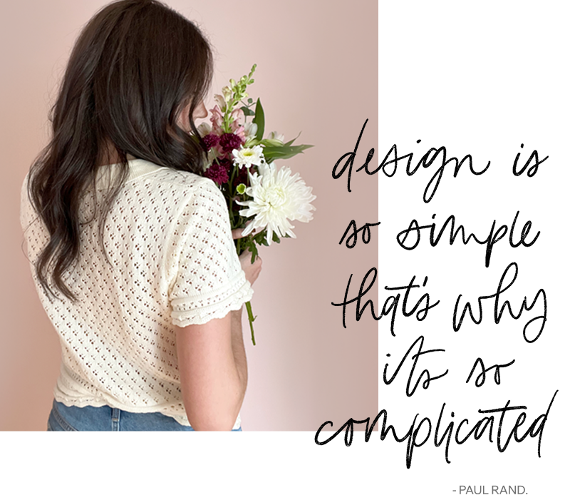 Madeleine Gagné holding a bouquet of flowers, facing a wall with text that says "Design is so simple, that's why it is so complicated" in a script font.