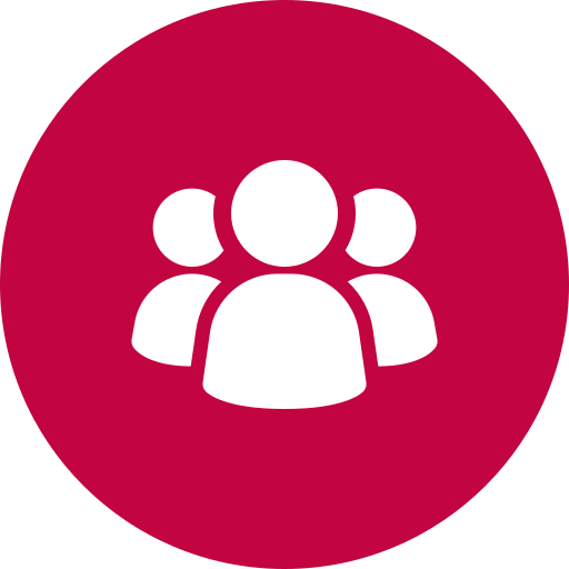 White icon of four people on a maroon circular background.