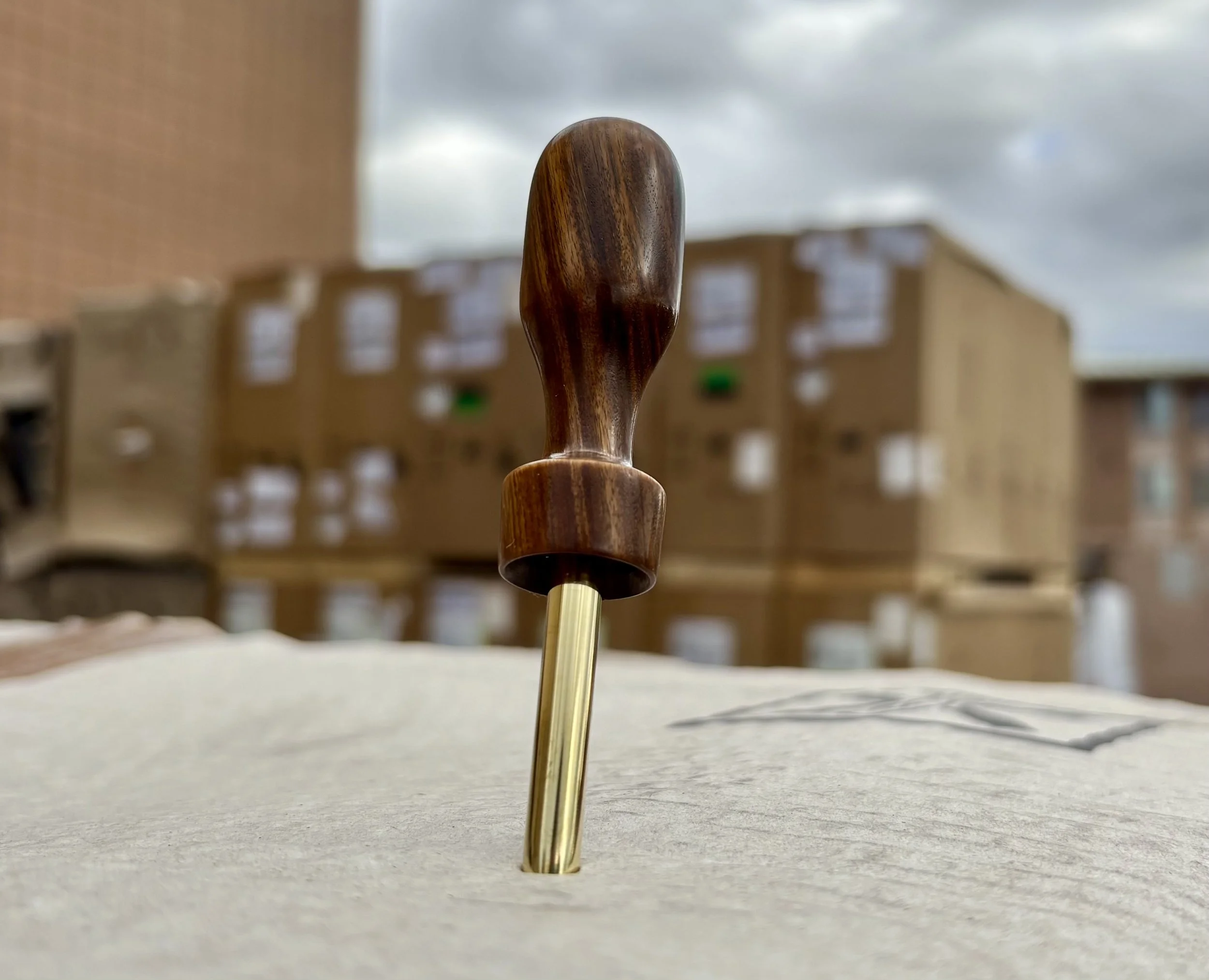 Divot tool for golf hand made from exotic wood with brass prong