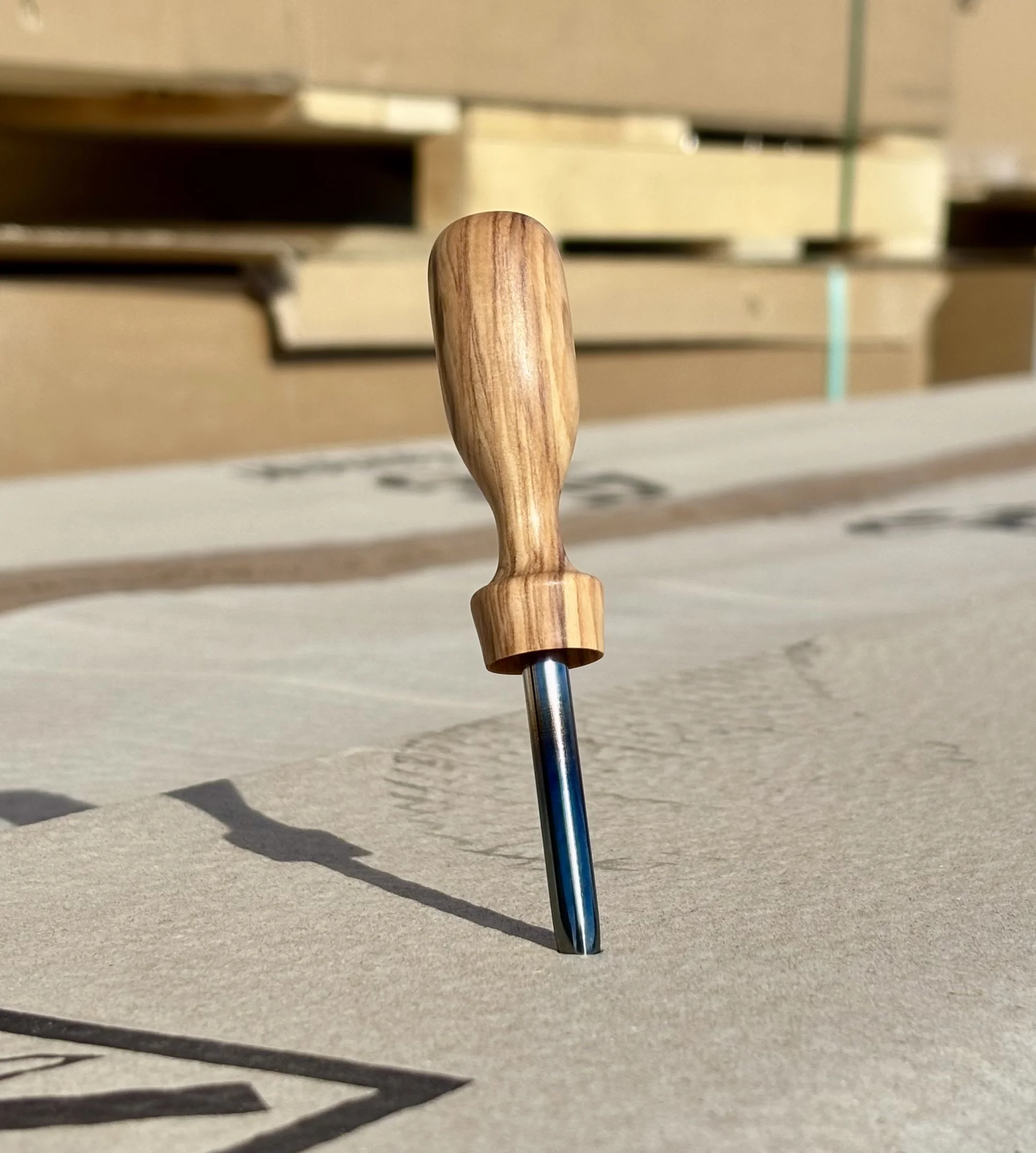 handmade divot tool made from olive wood. Tool is single prong styled and made from steel that is heat treated perfect golf accessorie