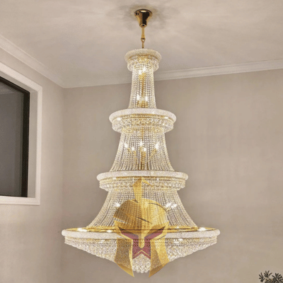 Elegant chandelier with multiple tiers of crystal beads hanging from a gold frame installed by Spartan Home Pros