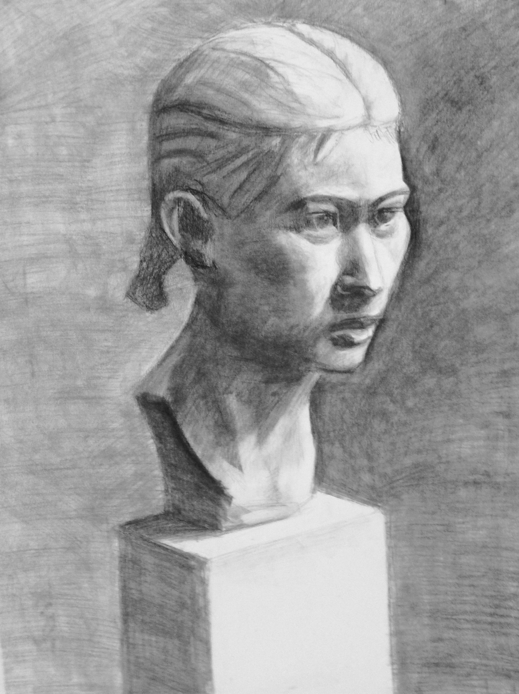 A pencil drawing of a woman’s bust showing her head and neck, mounted on a rectangular pedestal.