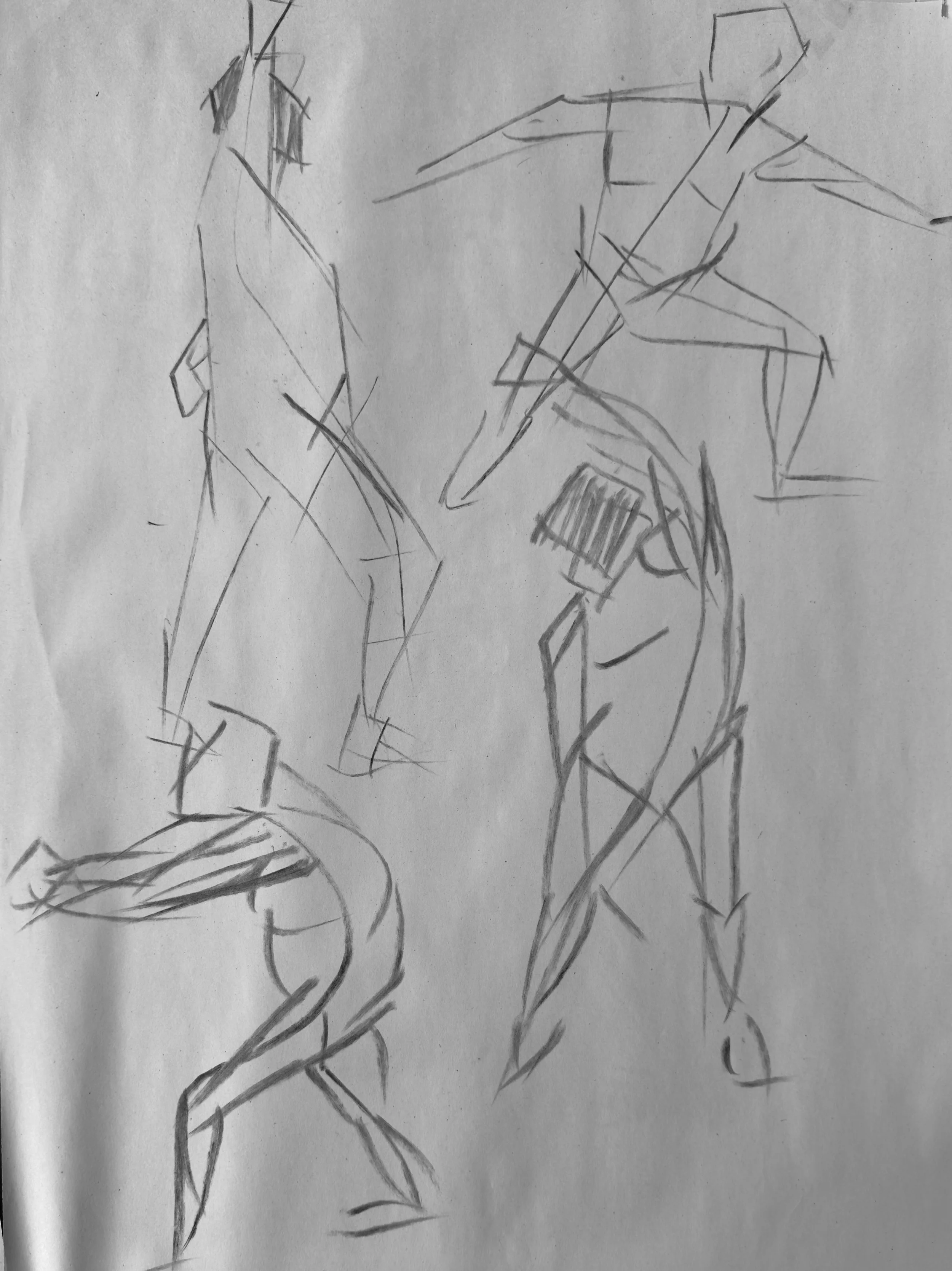 Quick pencil sketches of human figures in various poses.
