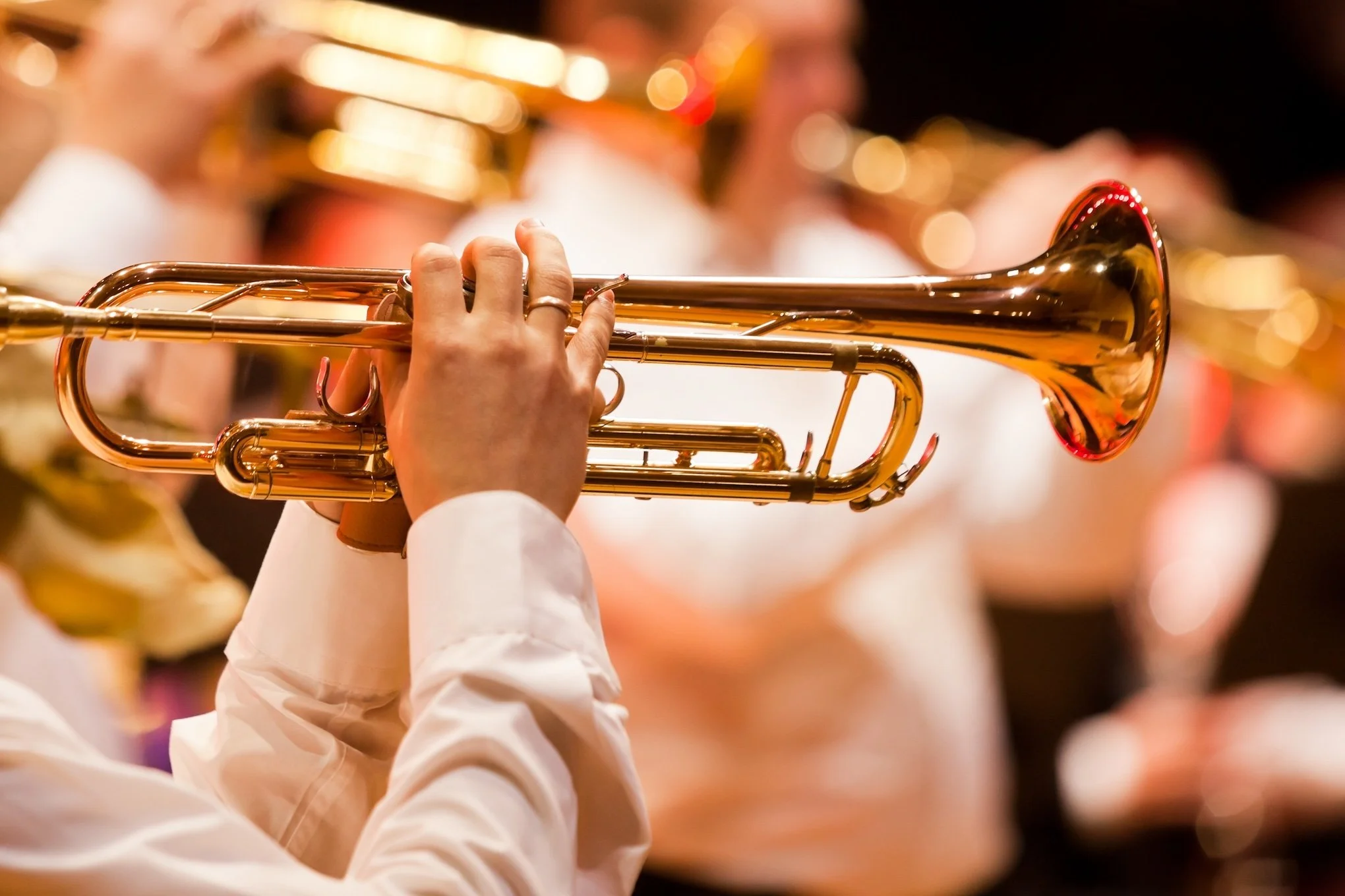 Closeup of hand on trumpet
