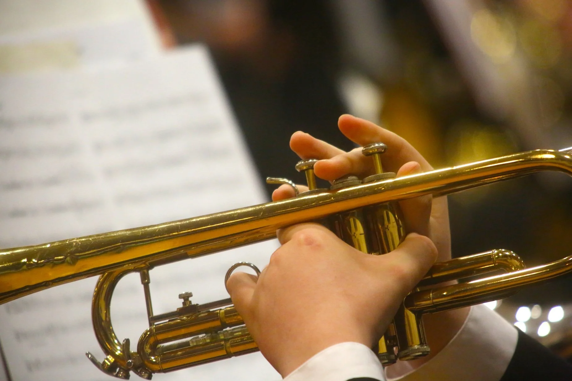 Student hands holding trumpet