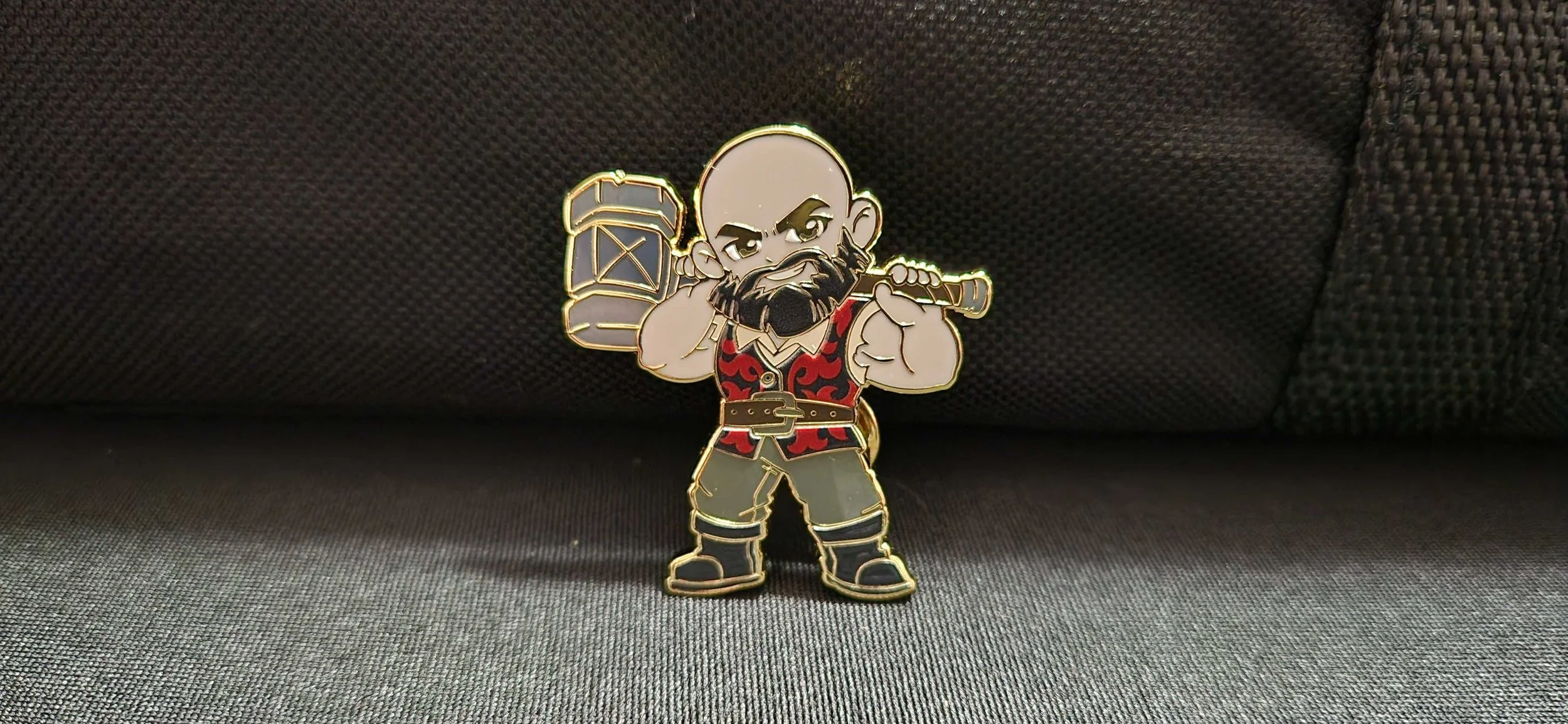 Aezik single enamel pin