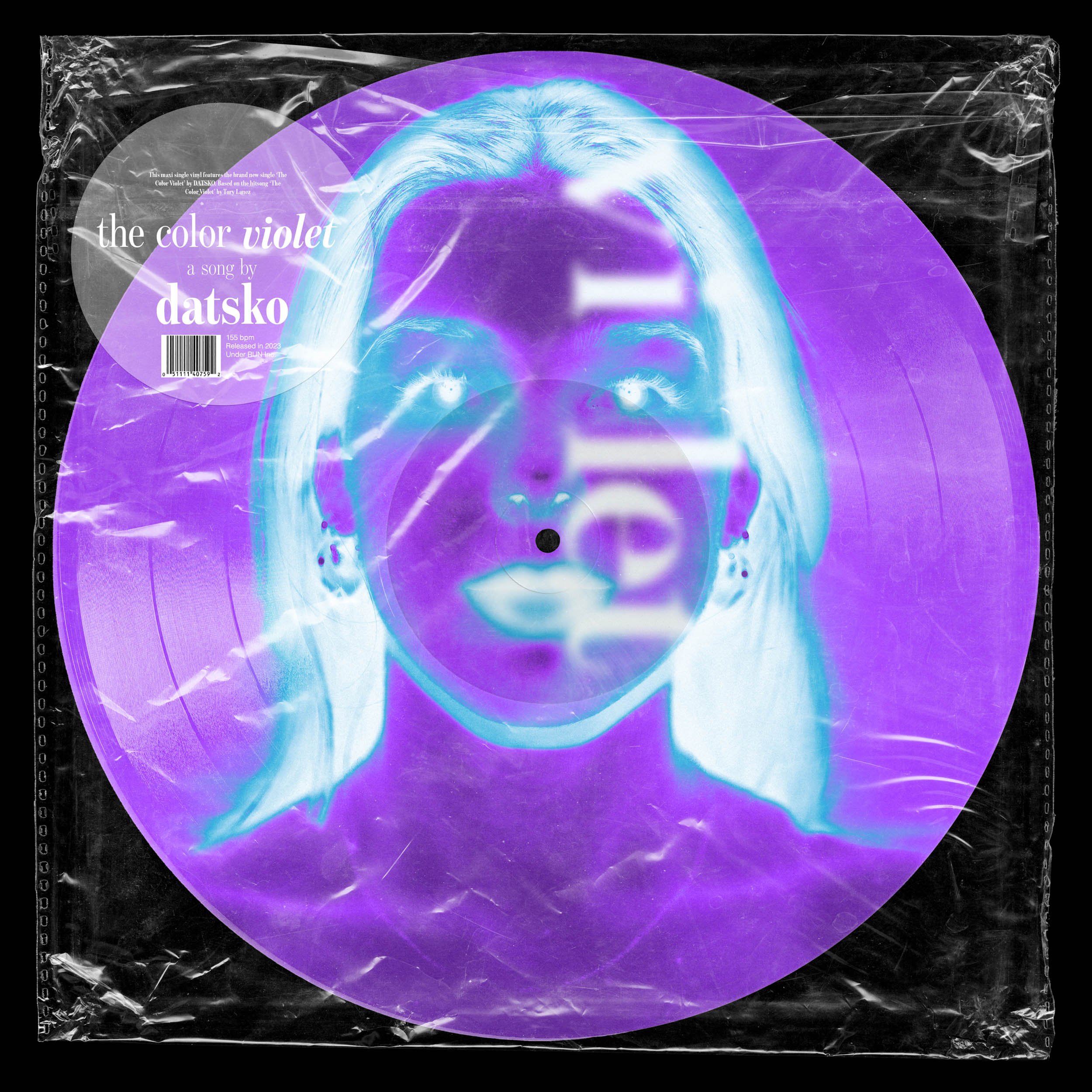 Violet-tinted vinyl record with a neon, inverted portrait of a woman's face, with text indicating a song titled 'the color violet' by Datsko.