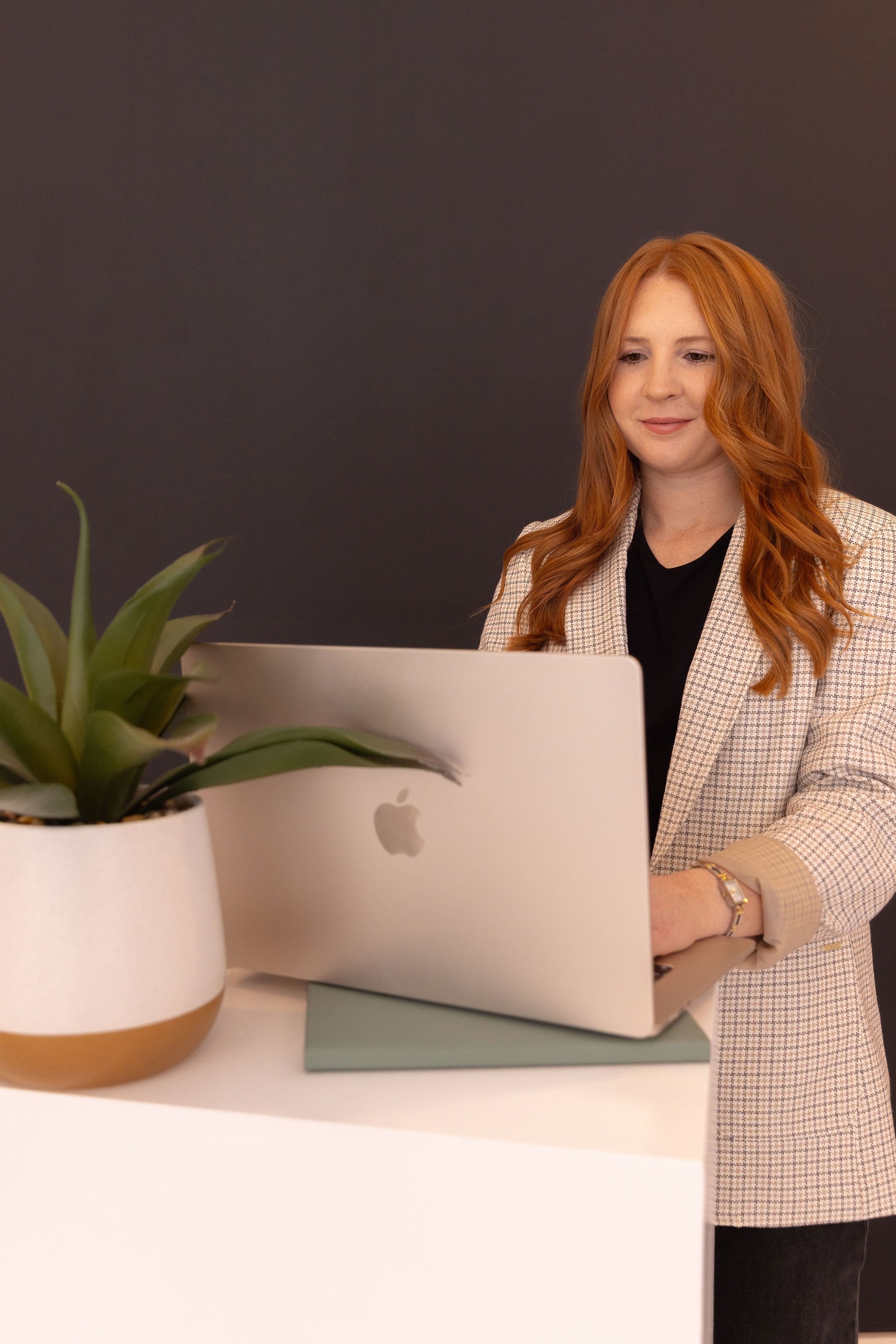 Redhead scheduling an event and running a tutoring business