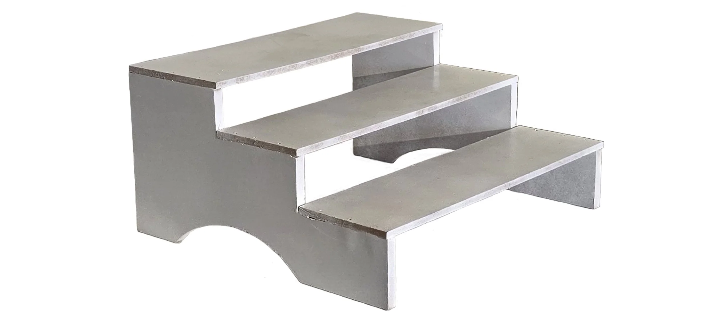 A small, three-step concrete staircase with flat horizontal surfaces and curved cutouts on the sides for support.