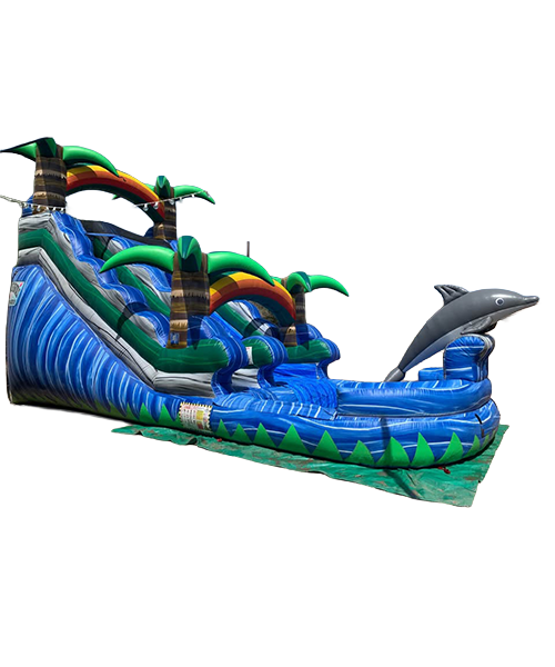 Inflatable water slide with a dolphin at the end, featuring palm trees, rainbows, and ocean waves design.