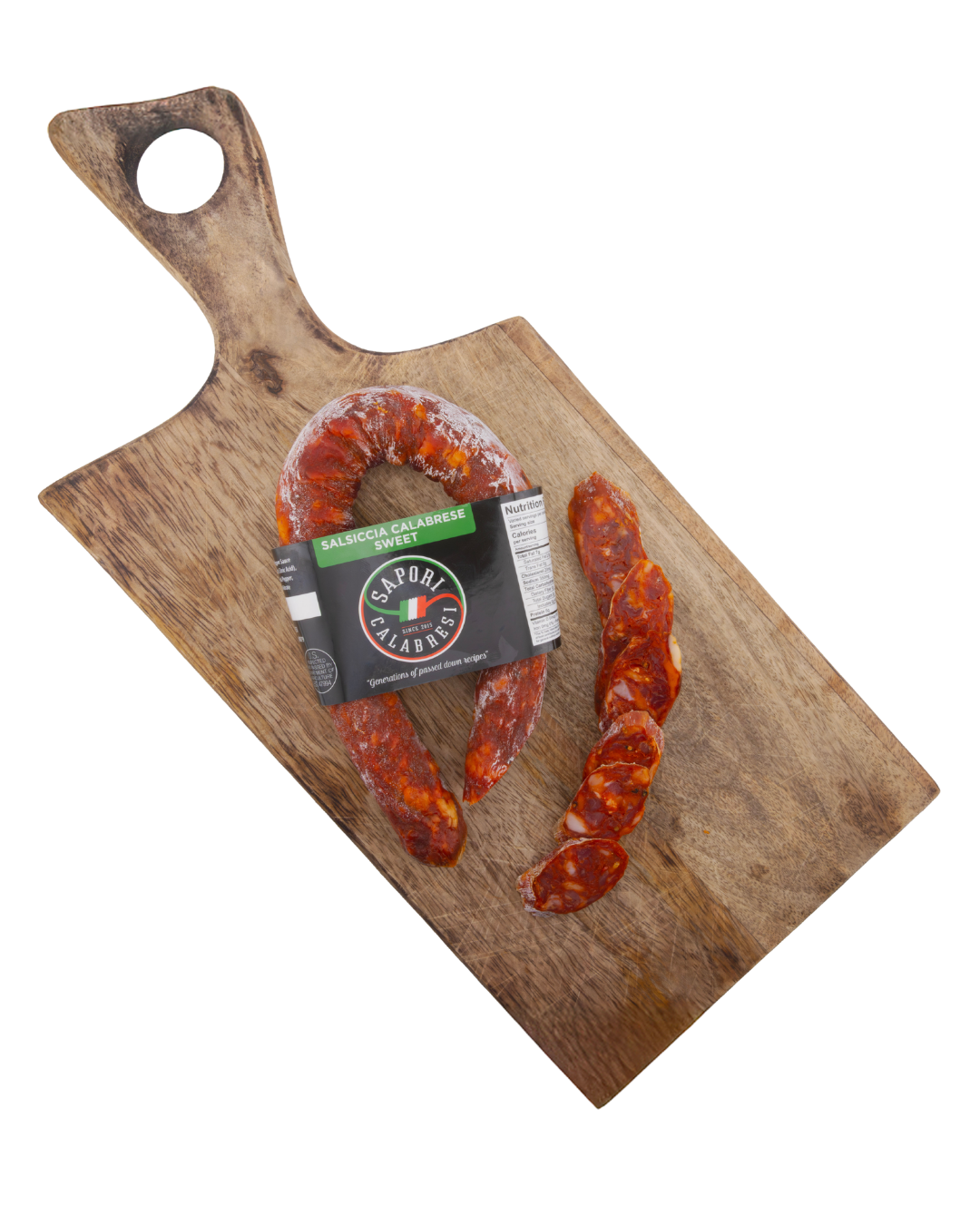 Raw Calabrese salami on a wooden cutting board, with sliced pieces beside it.